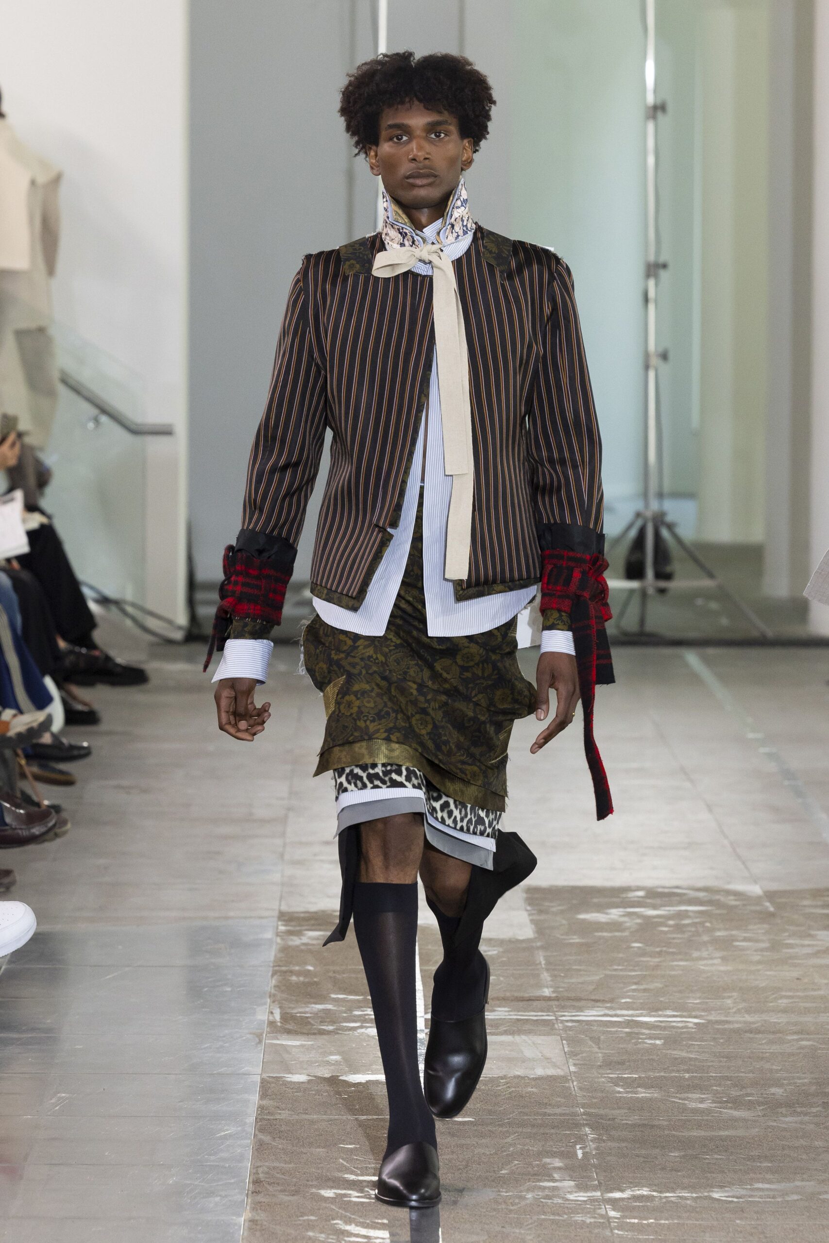 fitted striped jacket with flared skirt