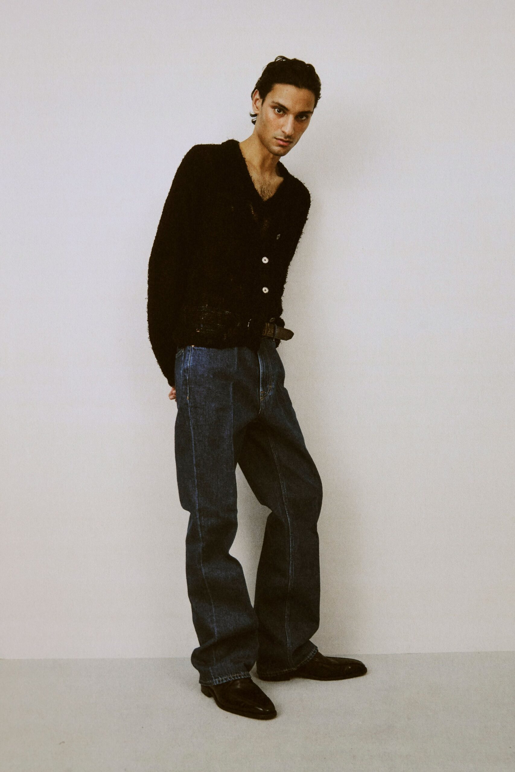black cardigan blue jeans