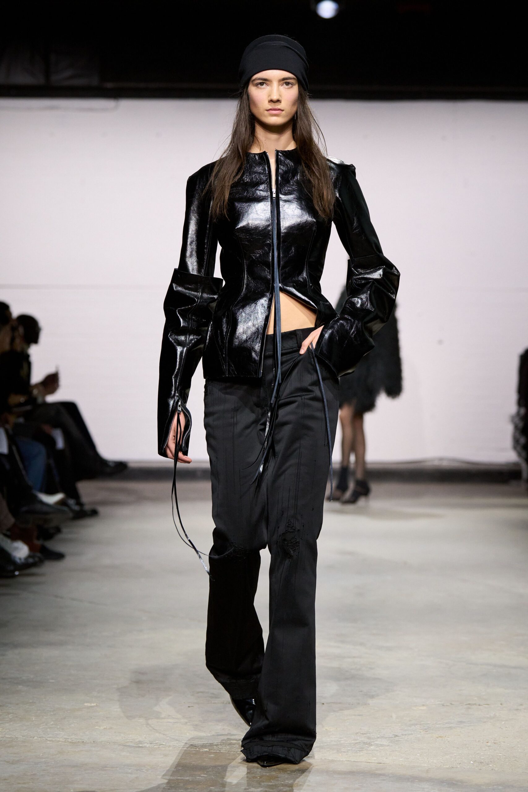 black leather long-sleeve collared fitted zippered shiny jacket