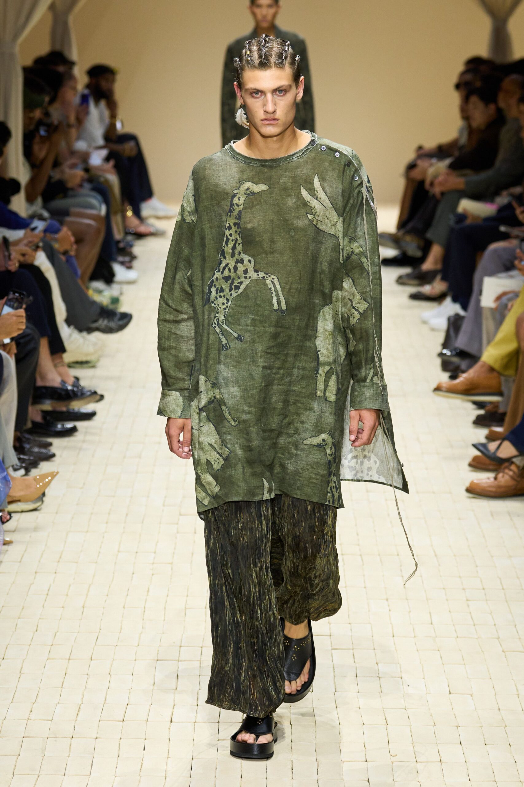 green printed top and pants