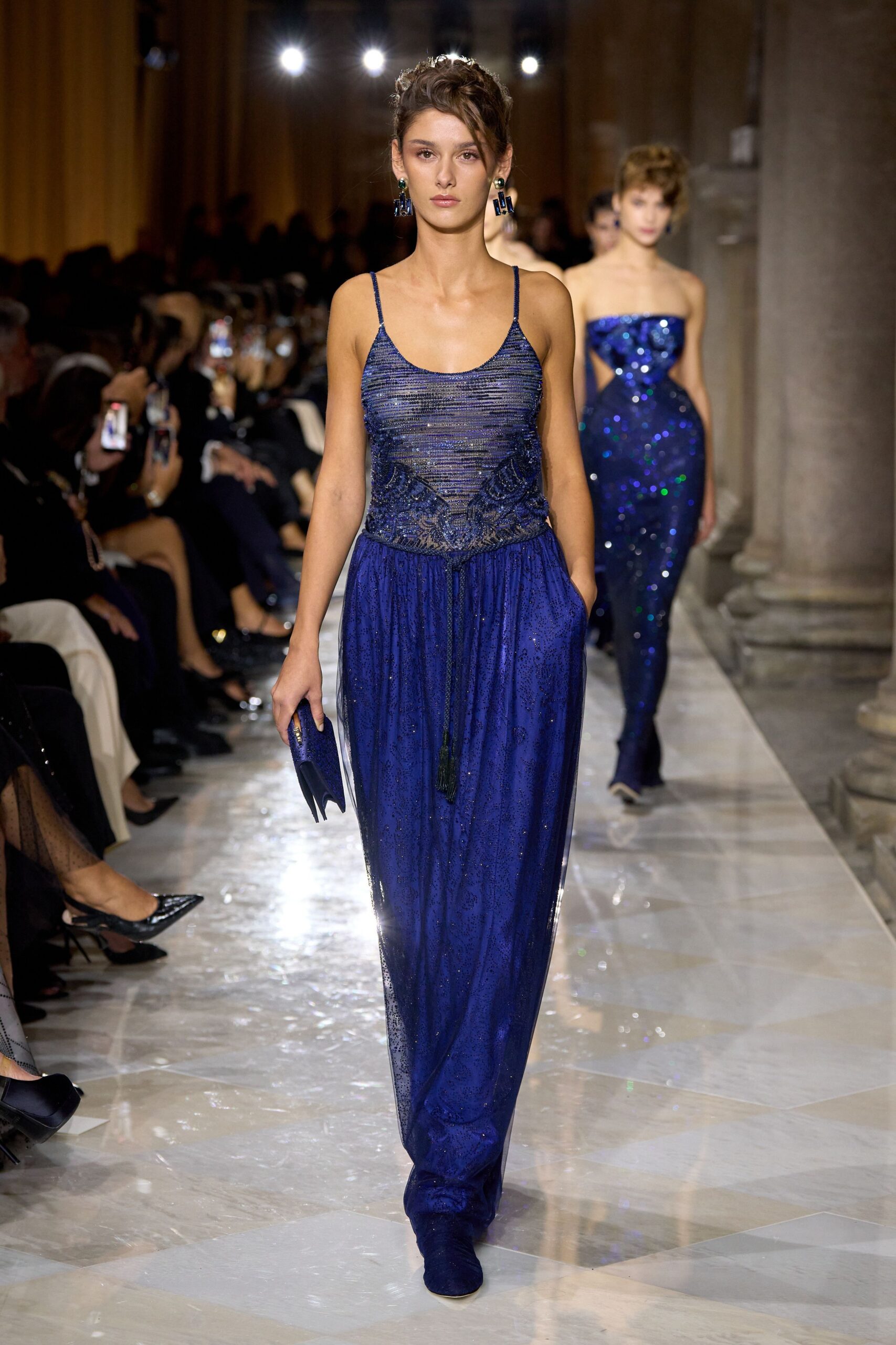 blue sequined maxi dress with clutch
