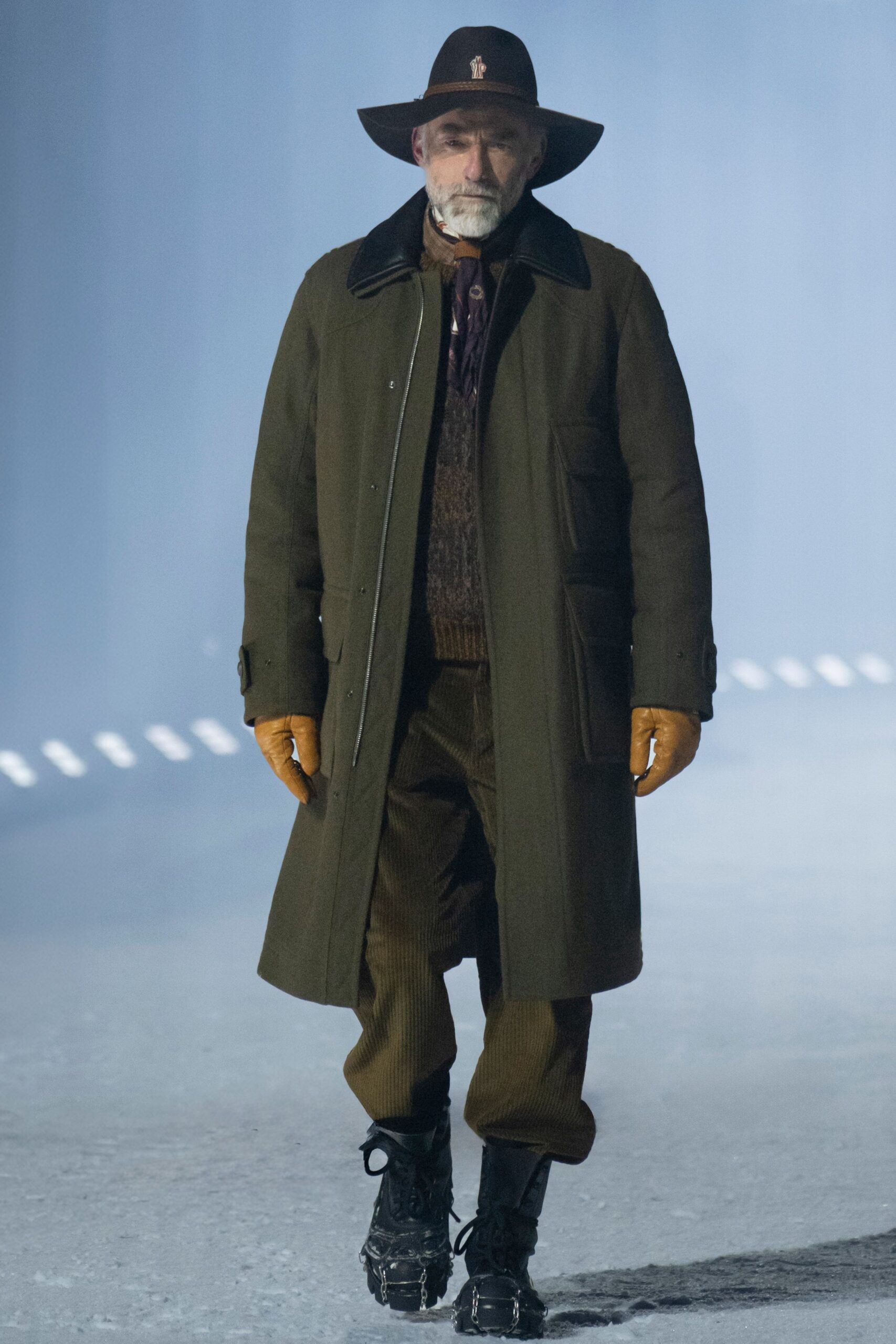 green wool coat with brown sweater
