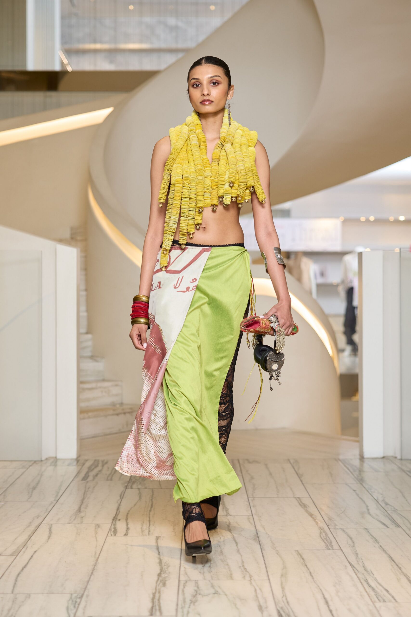 green midi skirt with yellow scarf