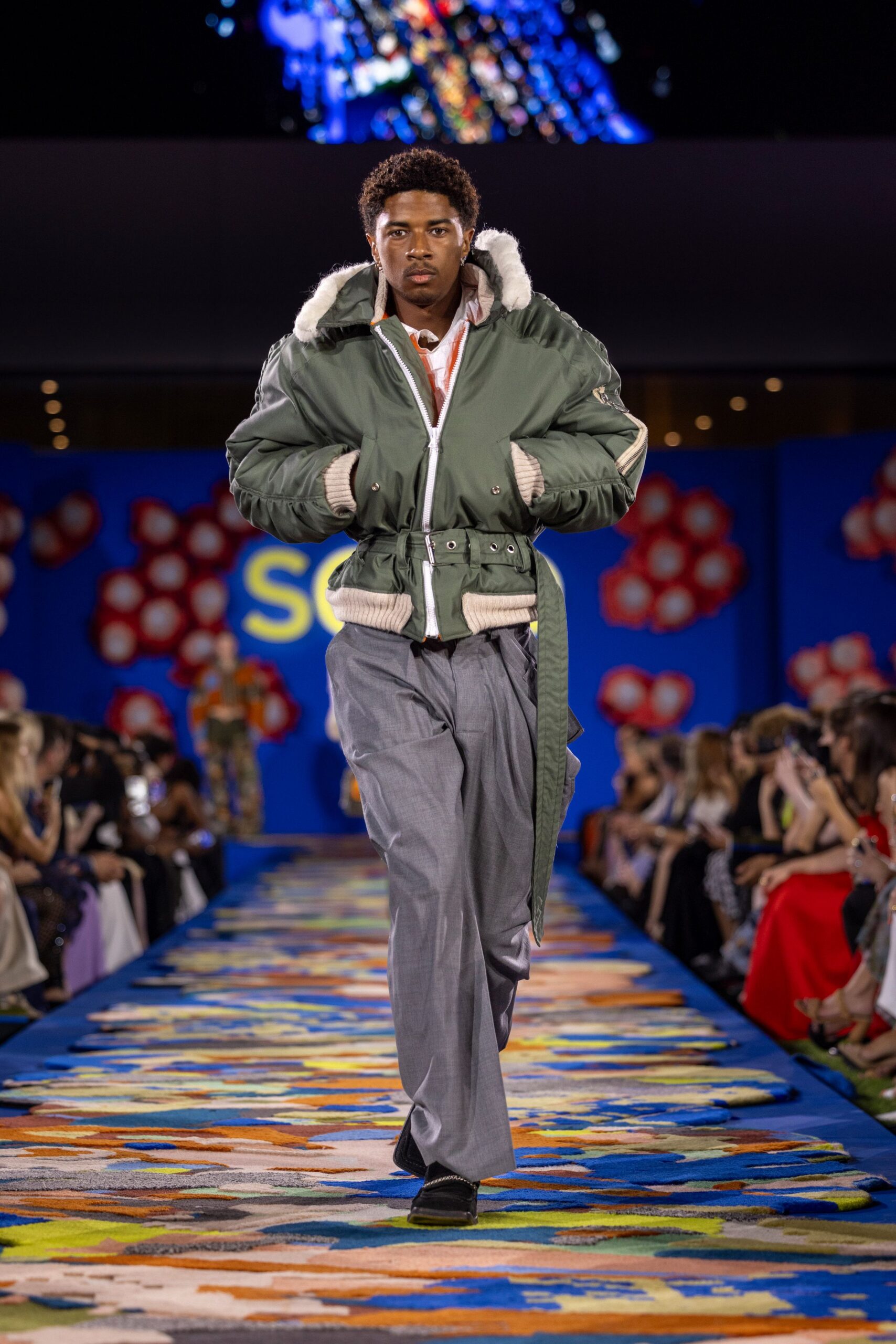 green relaxed jacket gray tailored pants