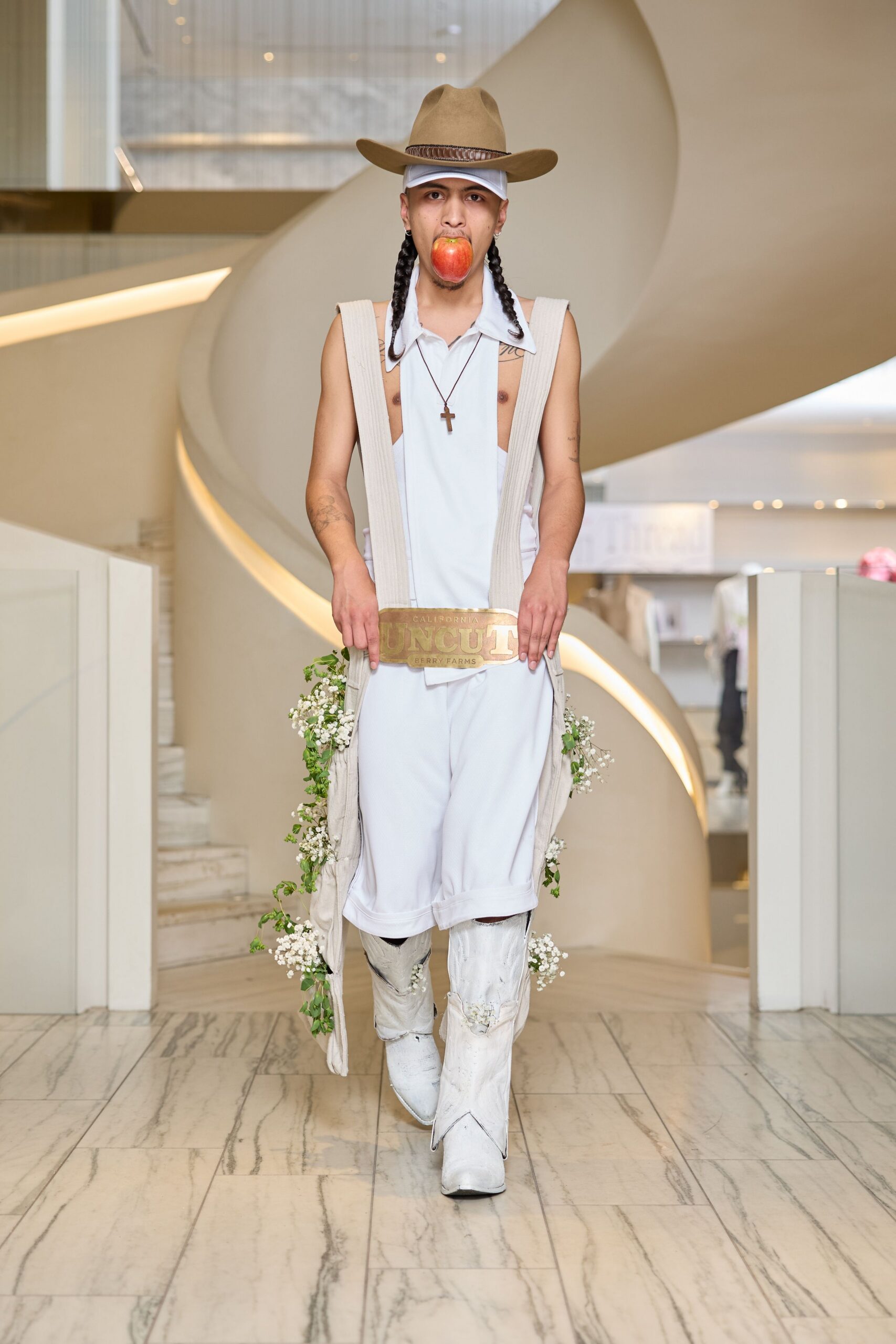 white relaxed jumpsuit with boots