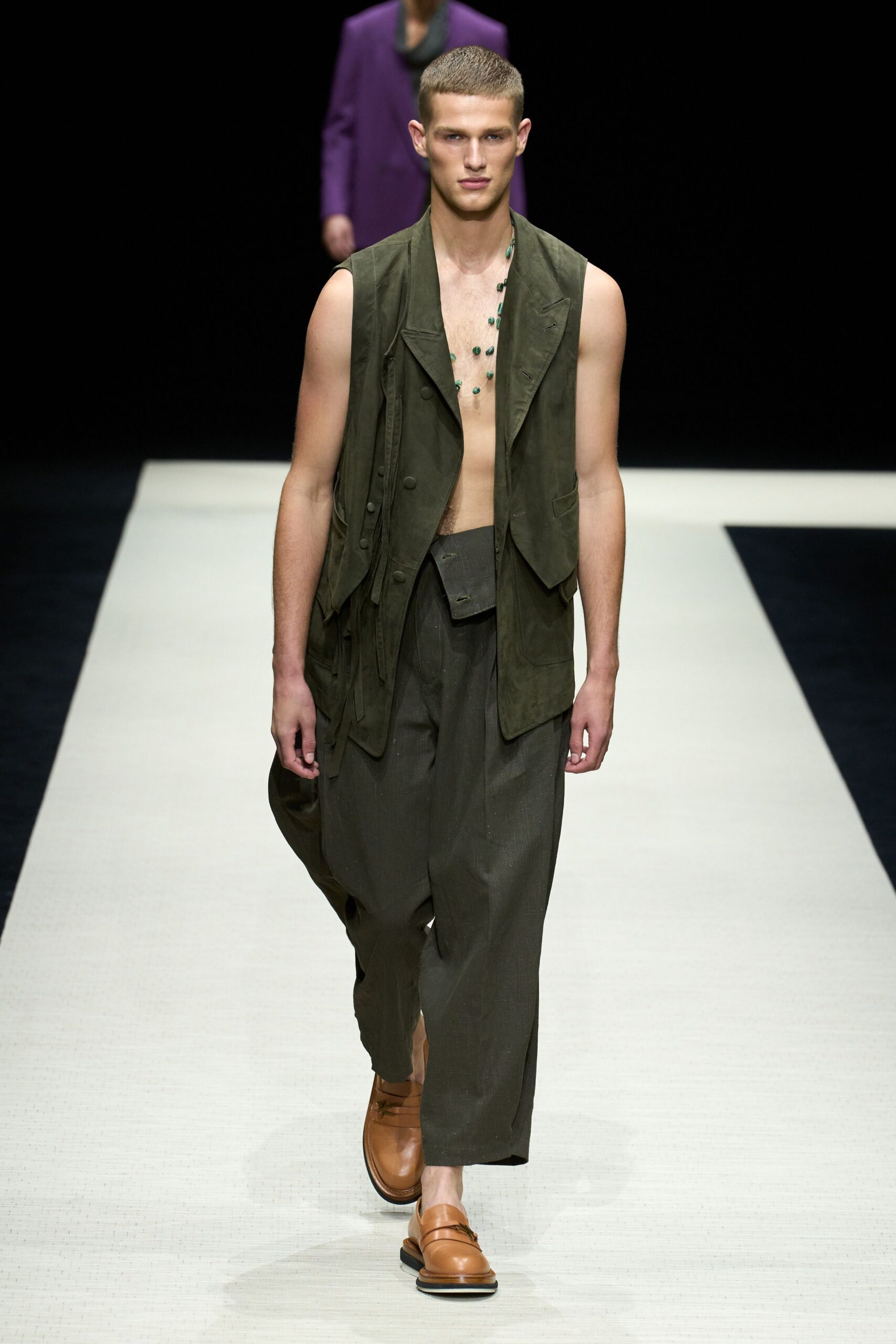 brown cotton vest with green pants