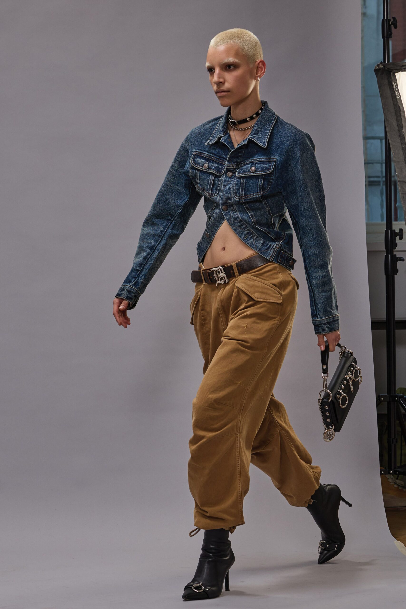 blue denim jacket brown pants