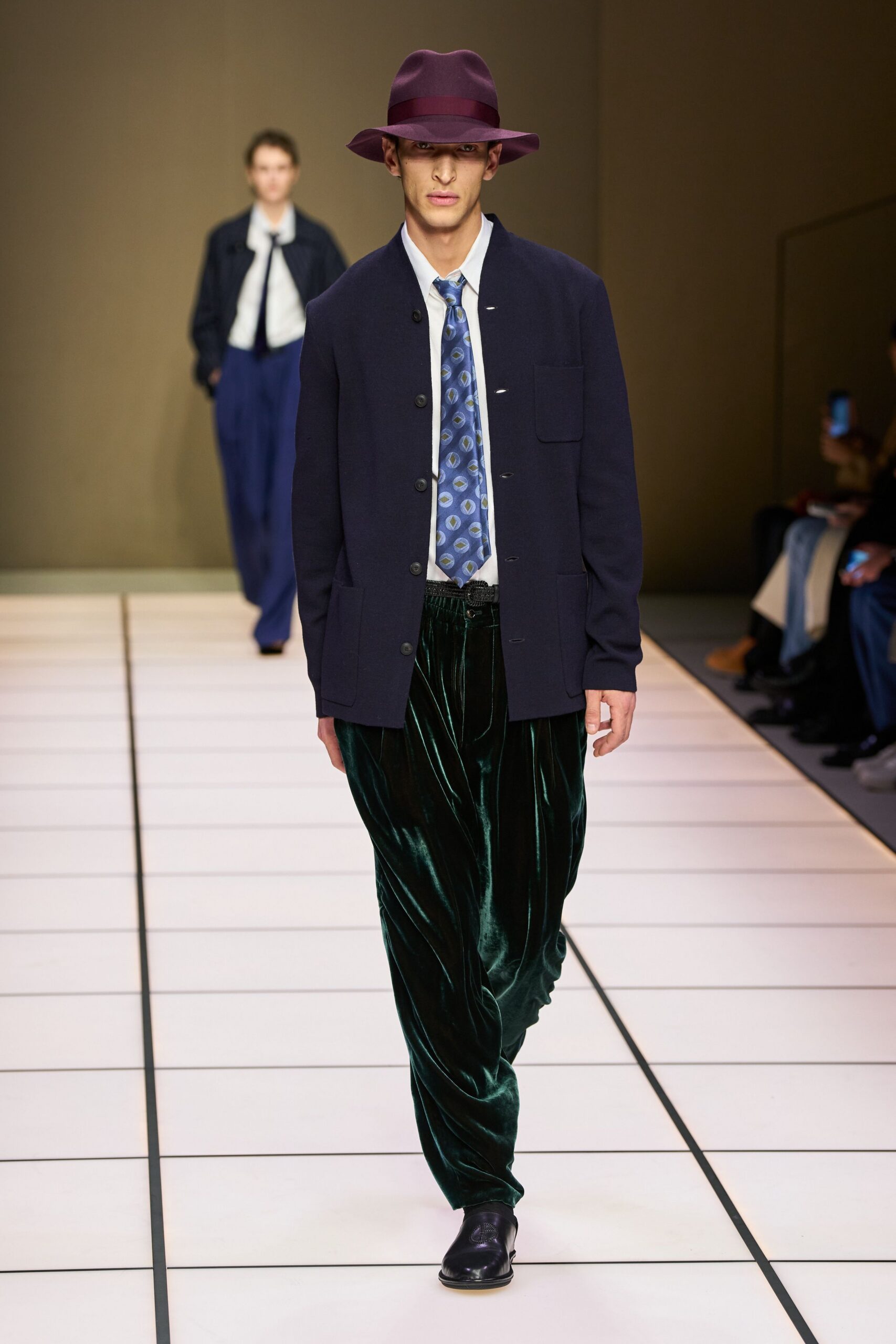 navy jacket white shirt green pants