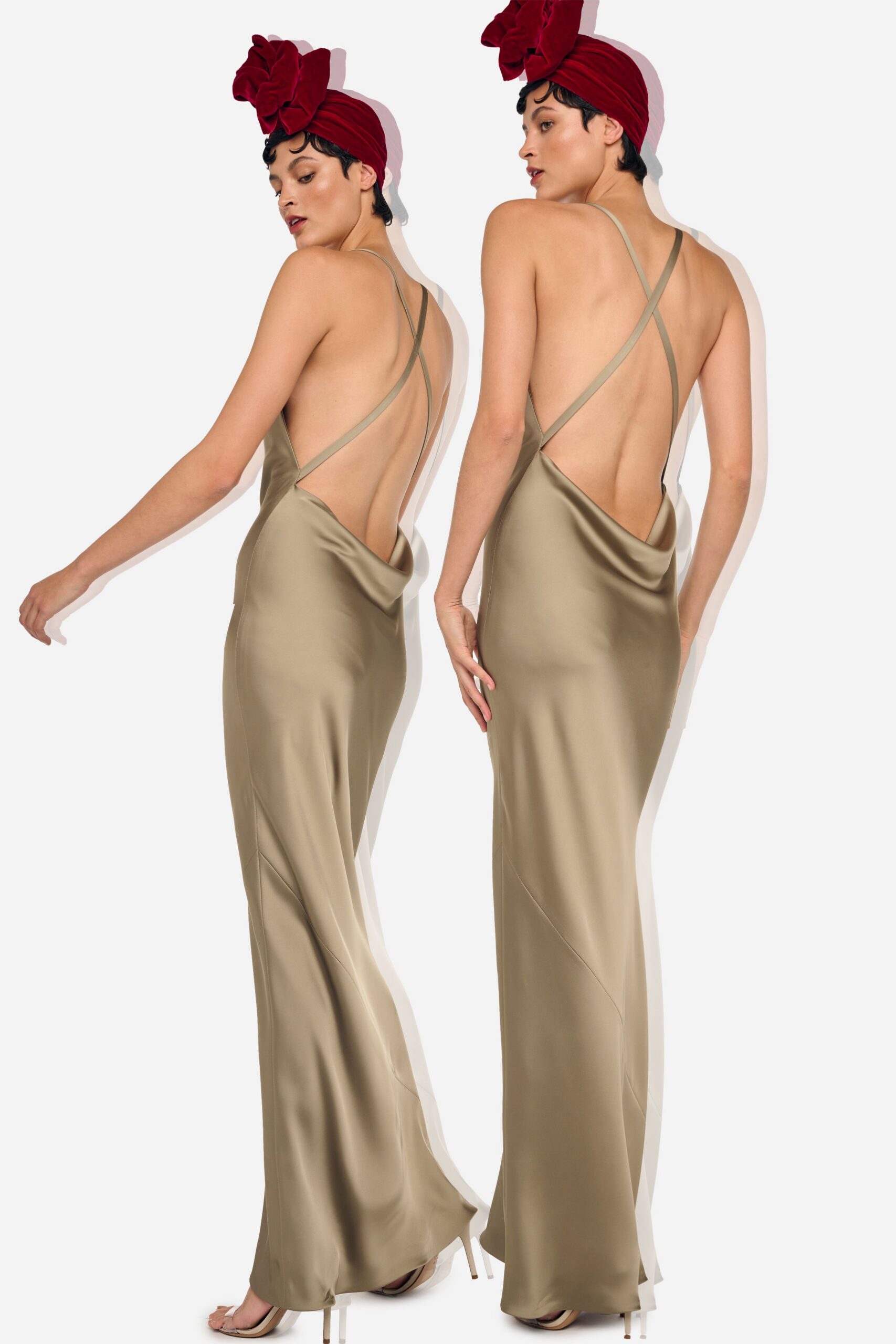 beige satin sleeveless backless fitted draped flowing gown
