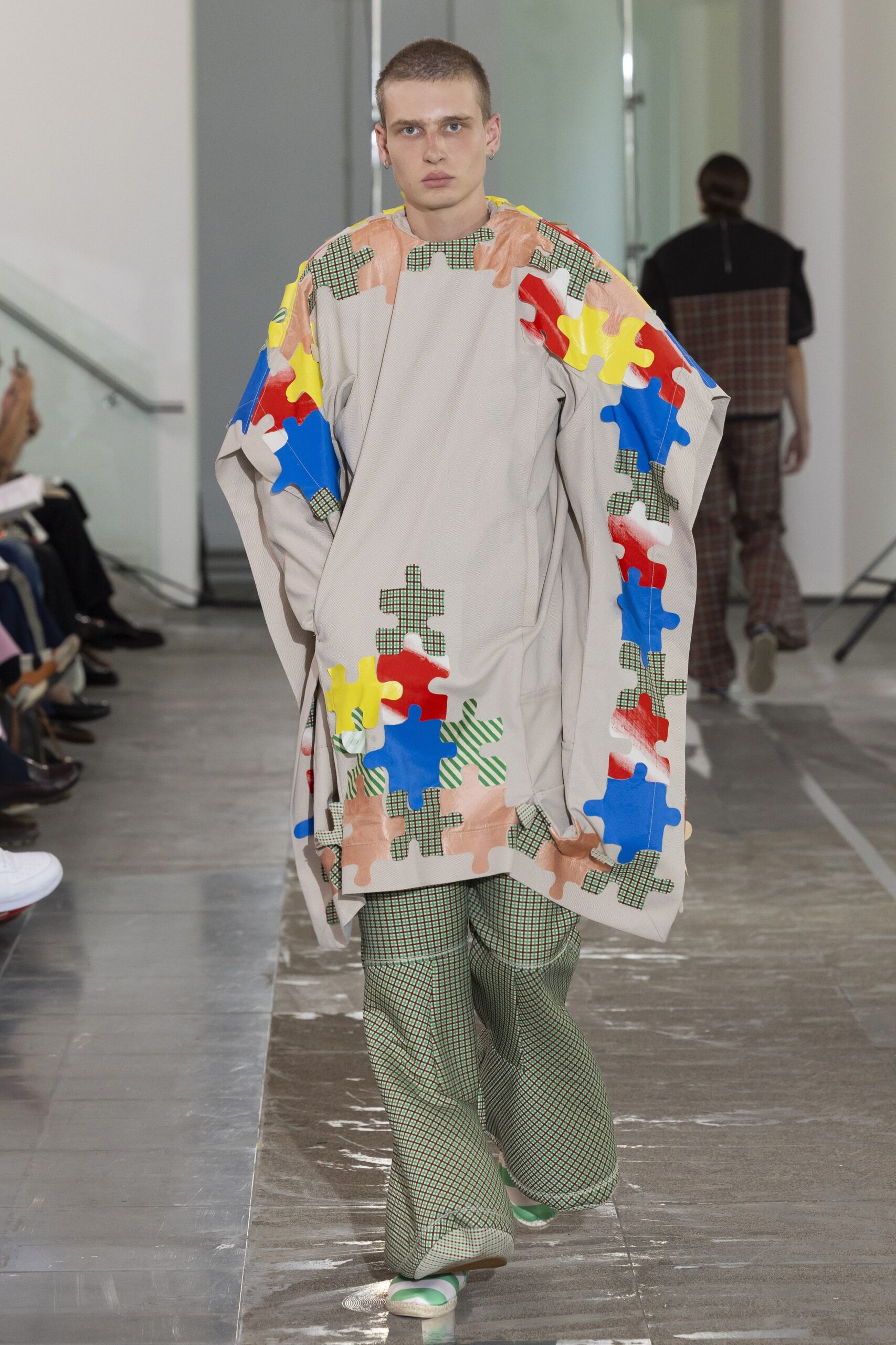 beige multi-colored cape with checked pants