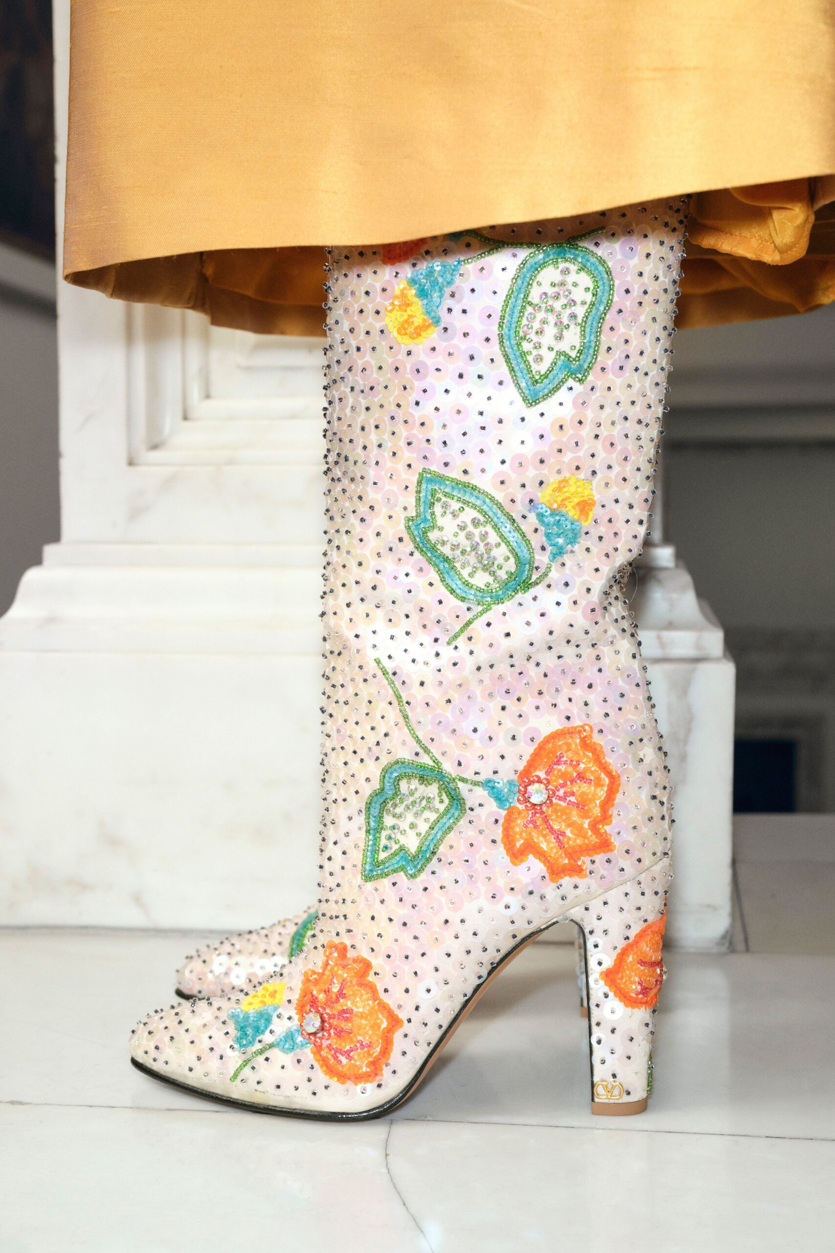 white embroidered beaded boots