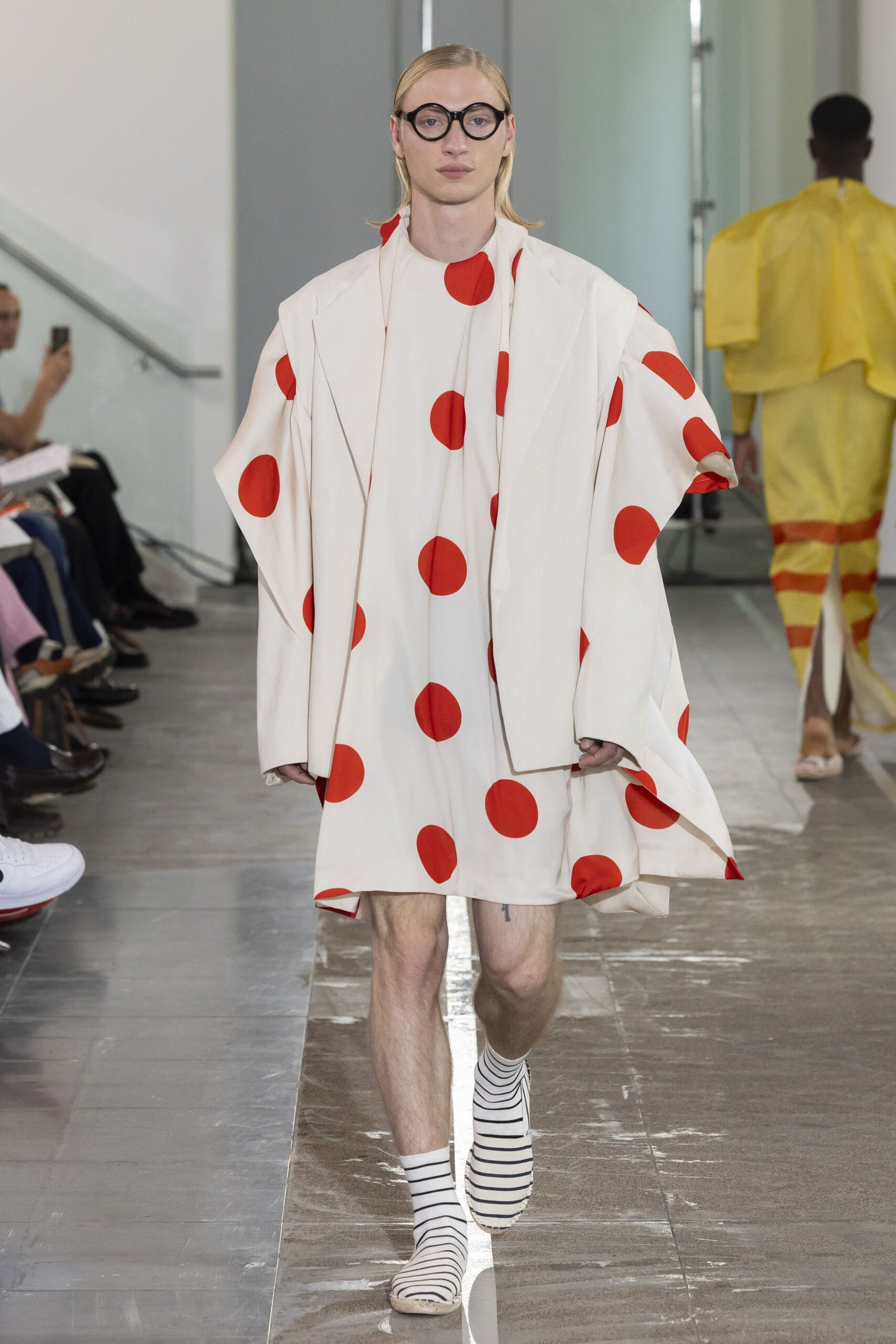 white polka-dot mini dress with oversized coat