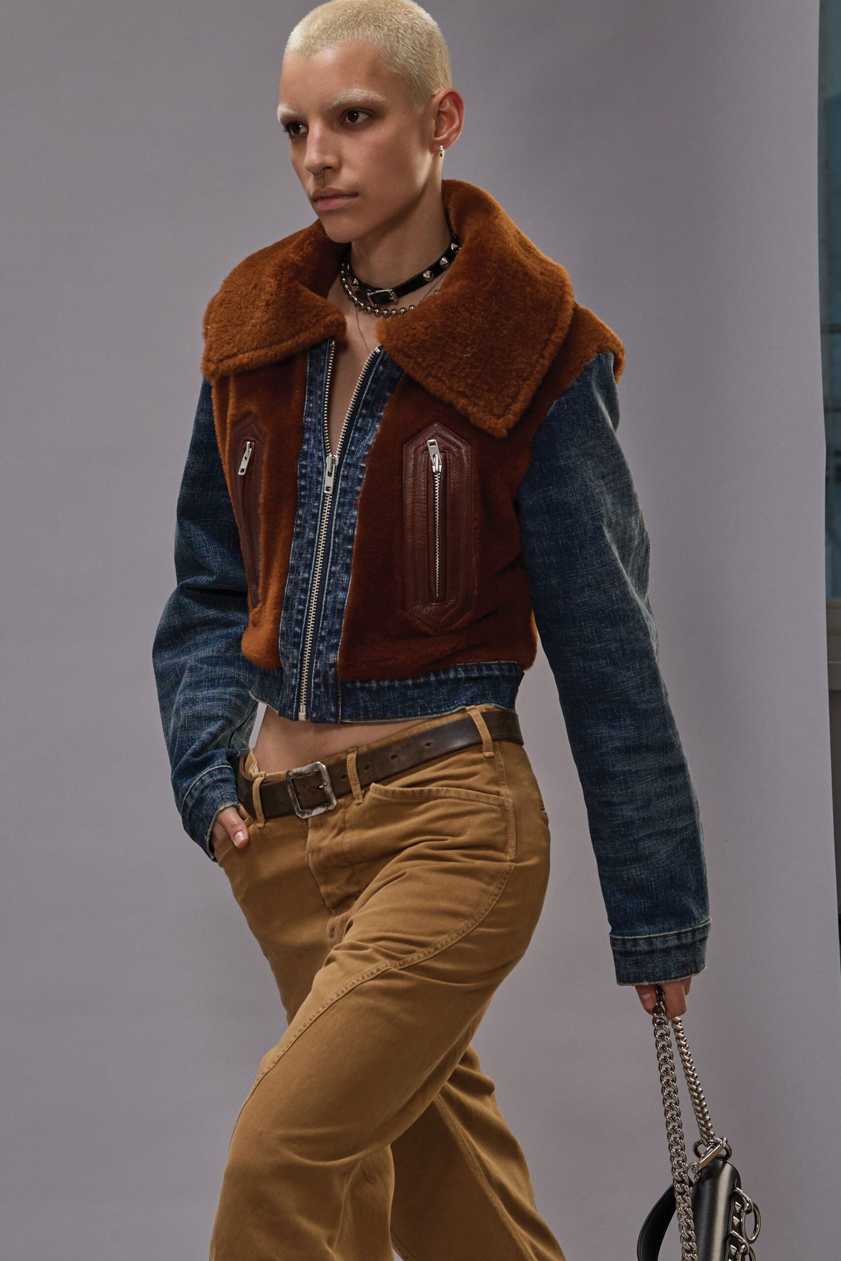 brown denim jacket with beige pants
