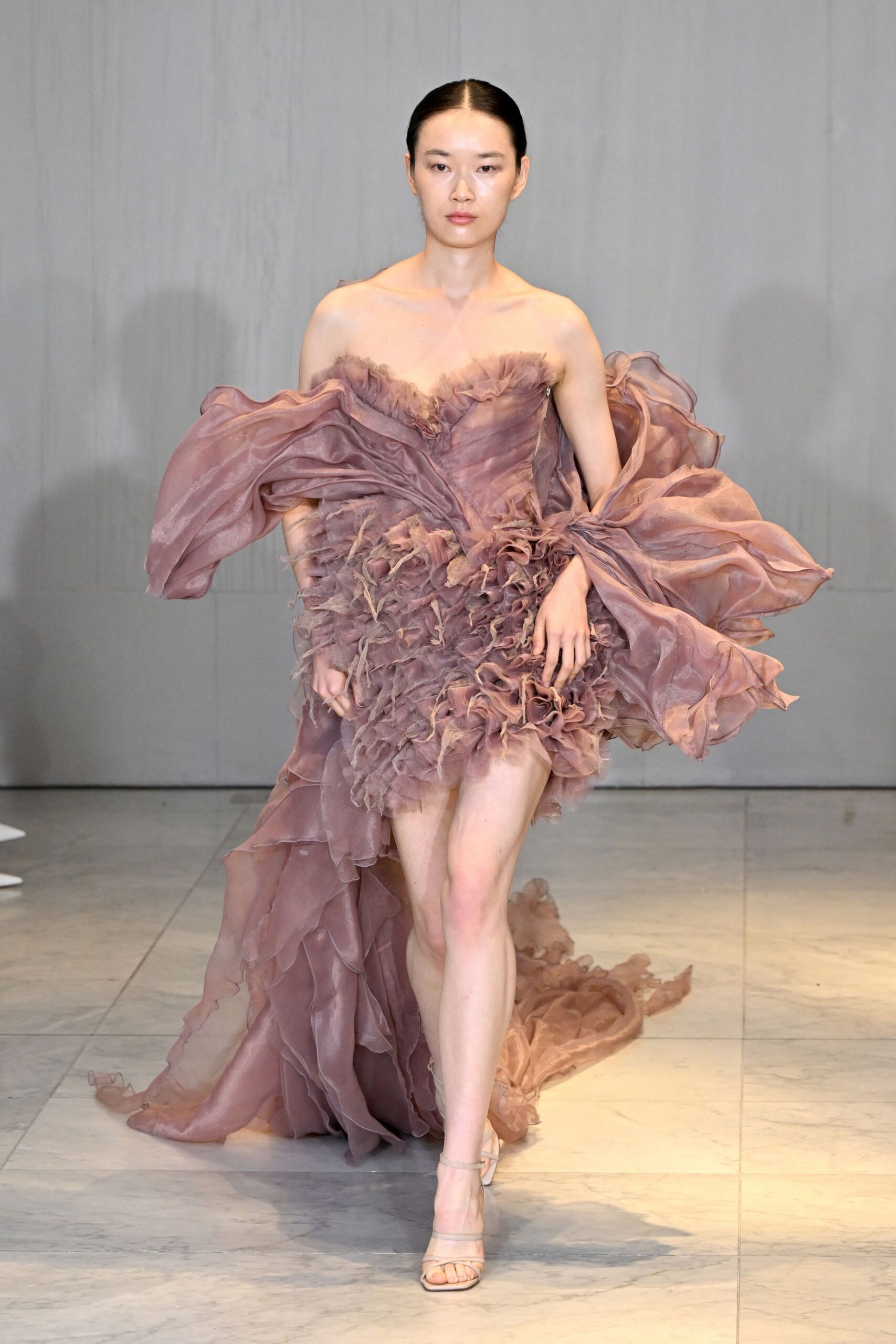 pink silk strapless fitted ruffled layered flowing dress