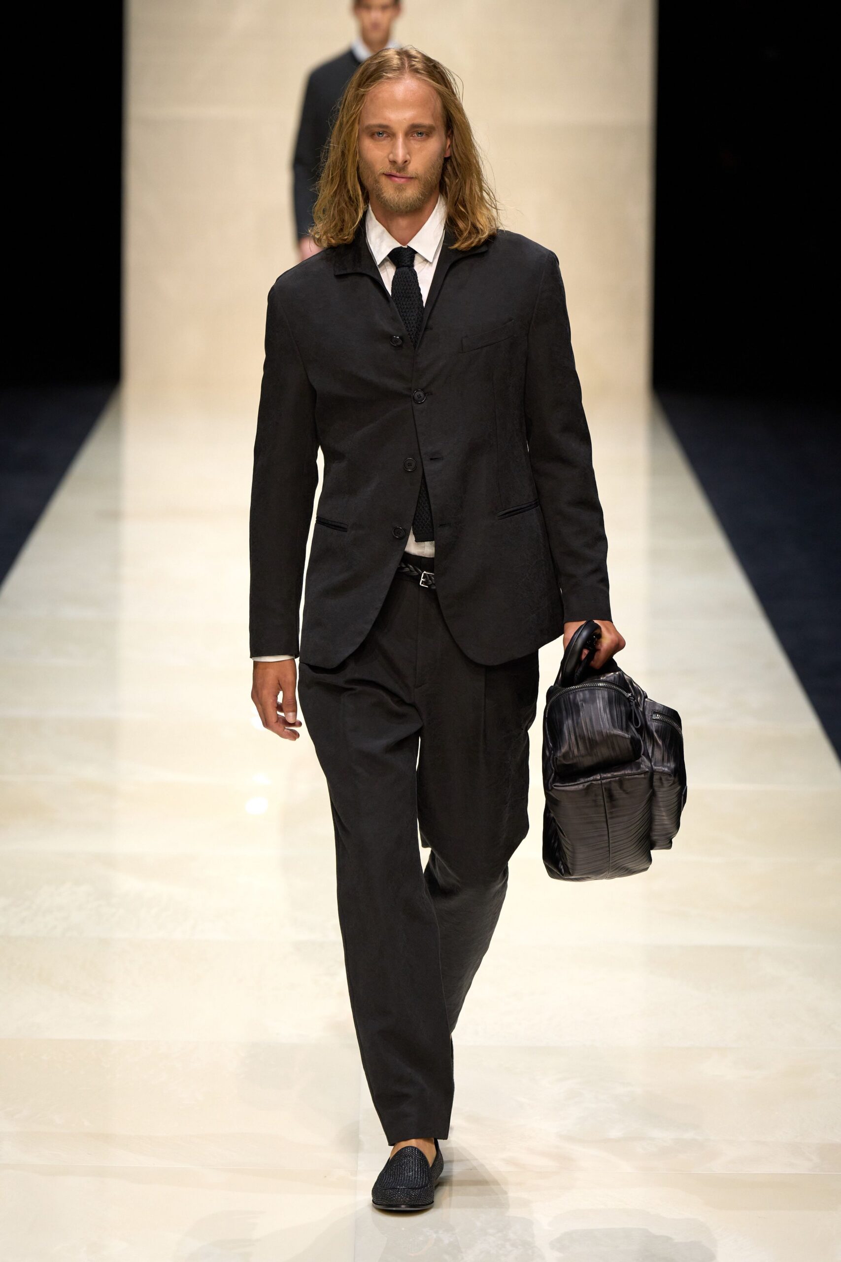 black tailored suit with bag