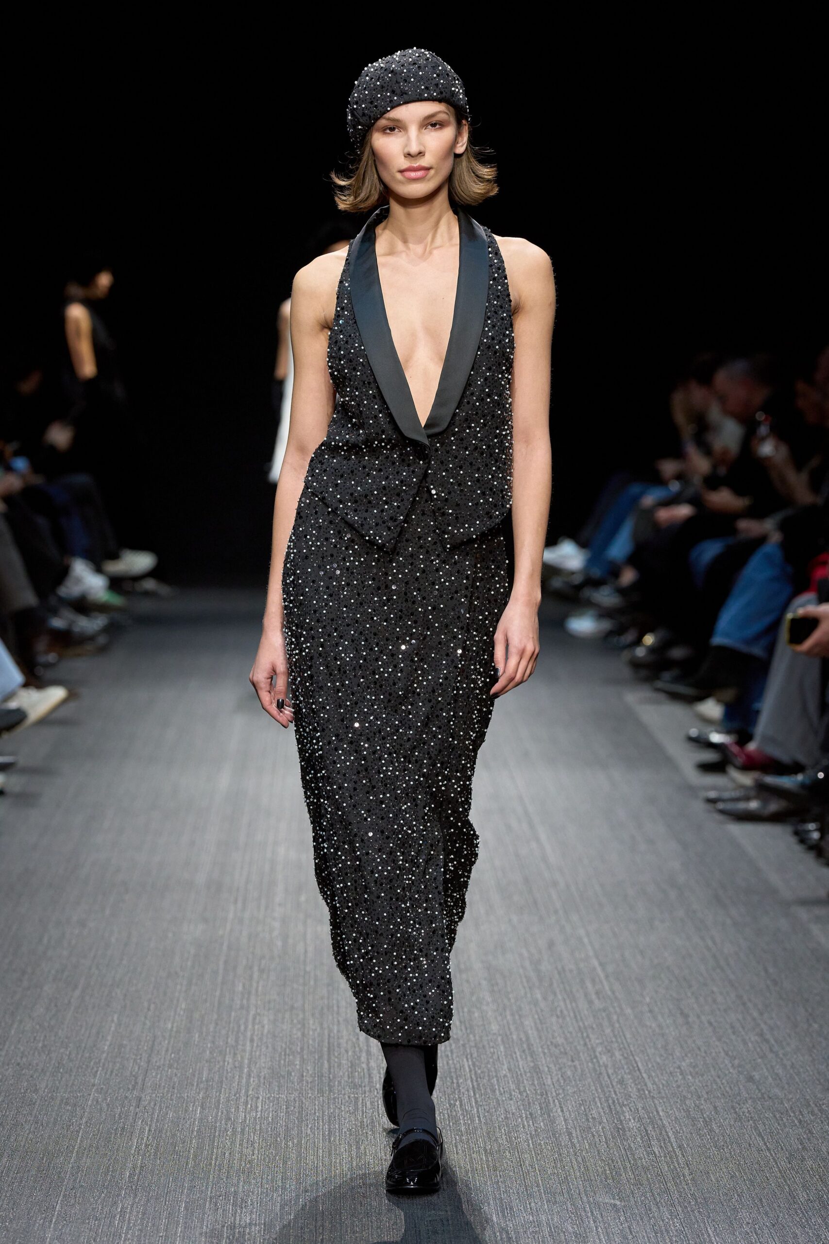 black sequined midi dress and hat
