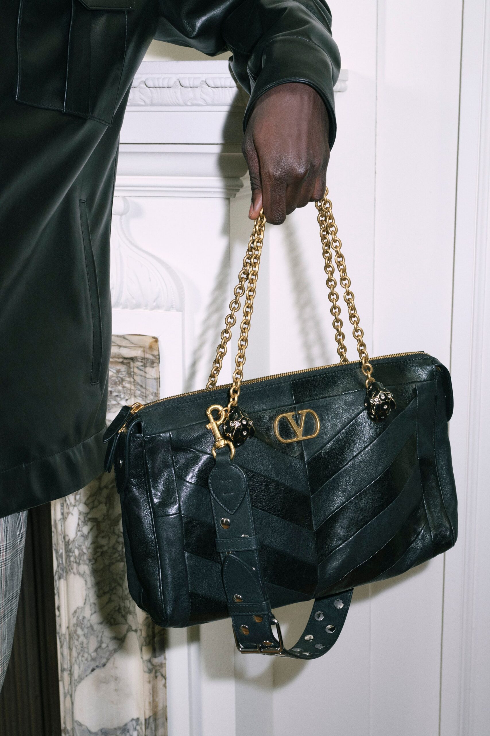black leather jacket and bag