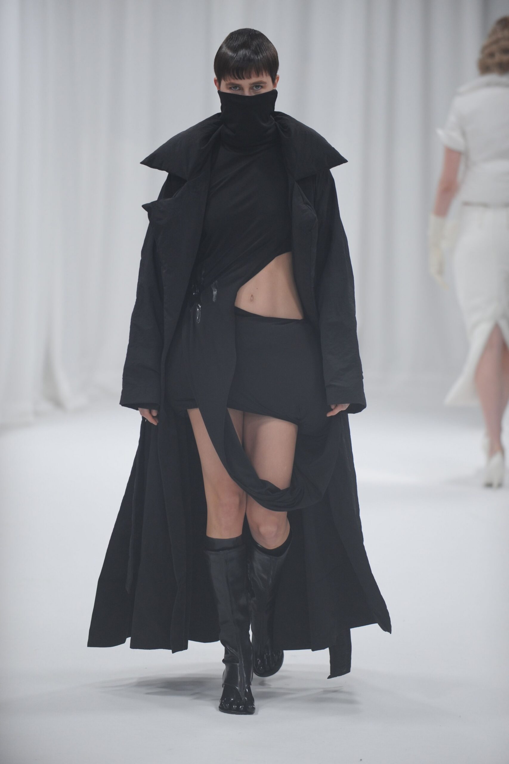 black coat and fitted top