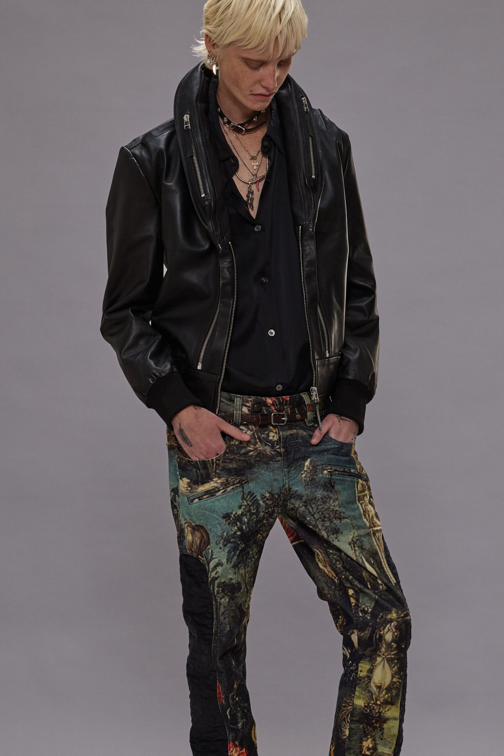 black leather jacket with printed pants