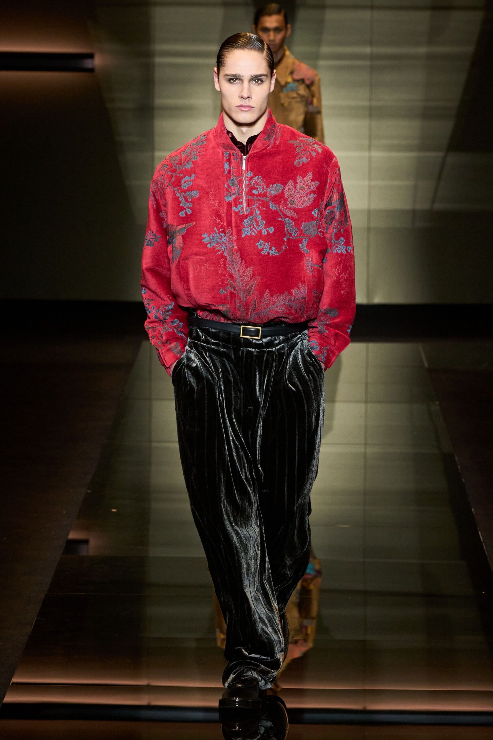 red embroidered shirt with black pants