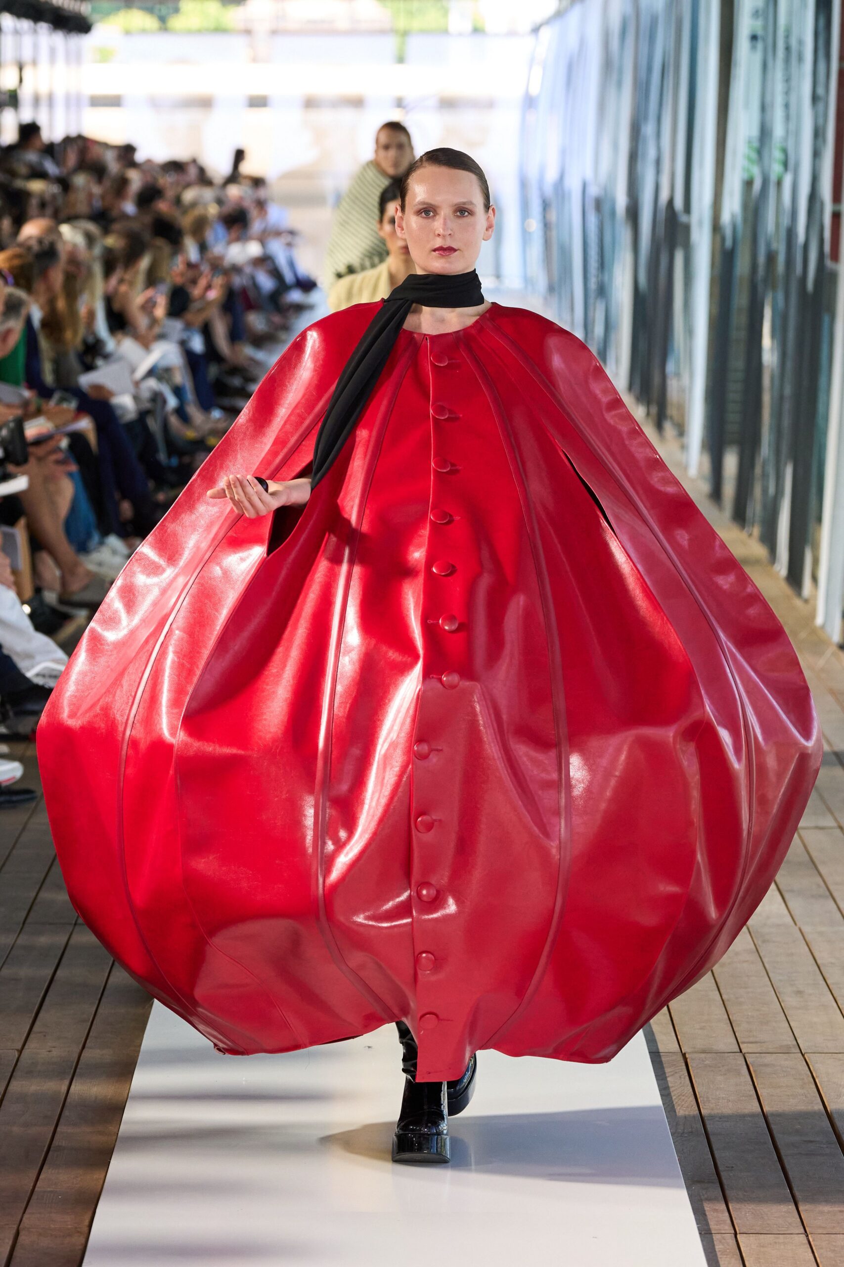 red vinyl long-sleeve collared structured buttoned dress