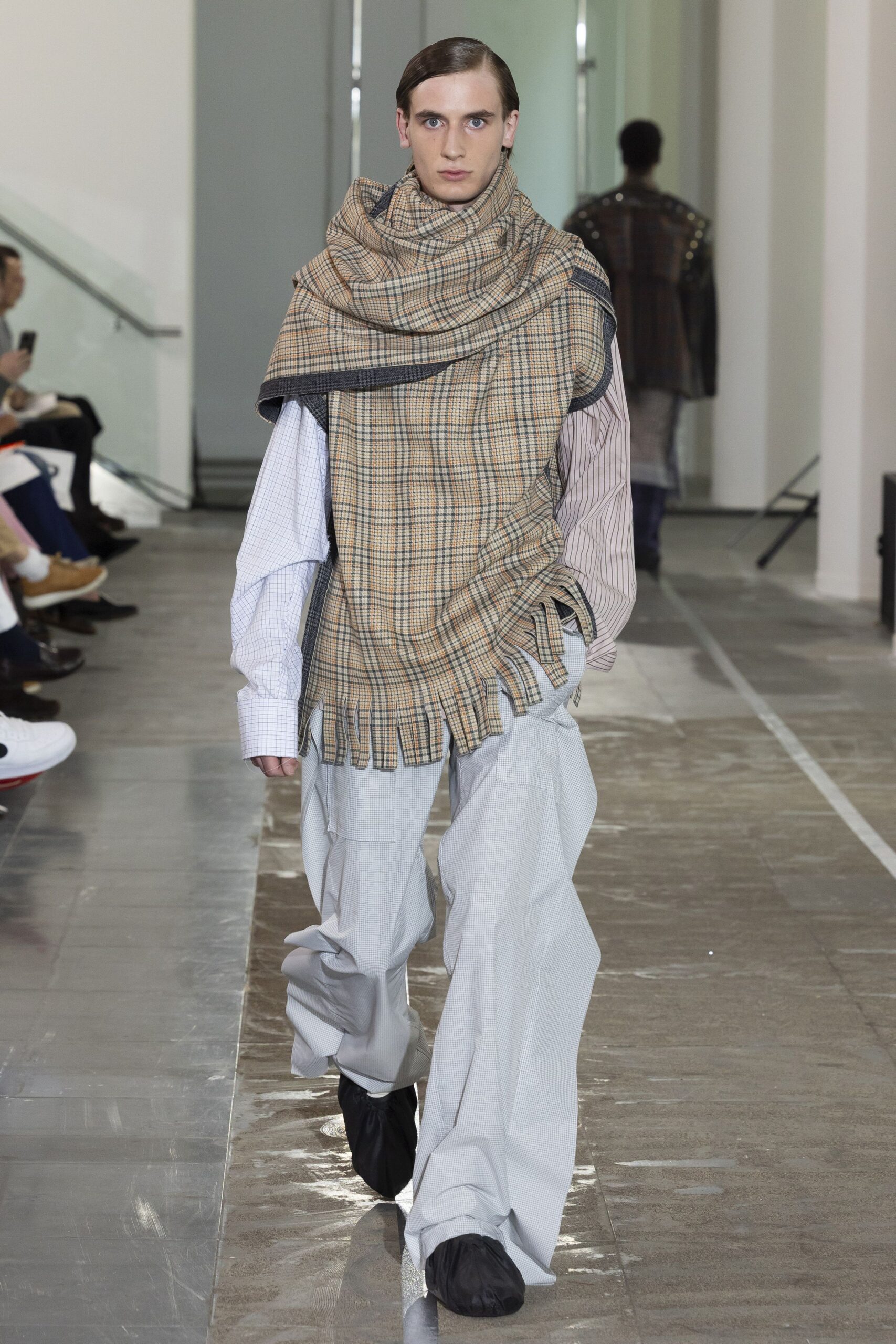 beige checked top with gray pants