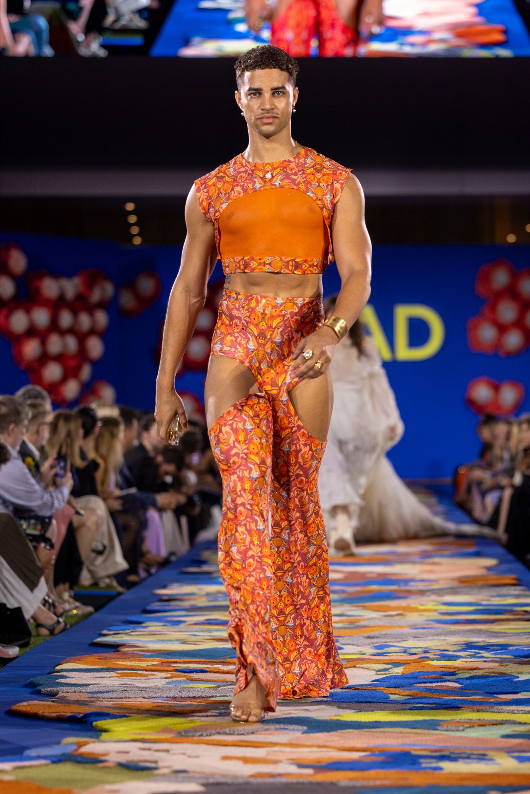 orange floral crop-top and pants