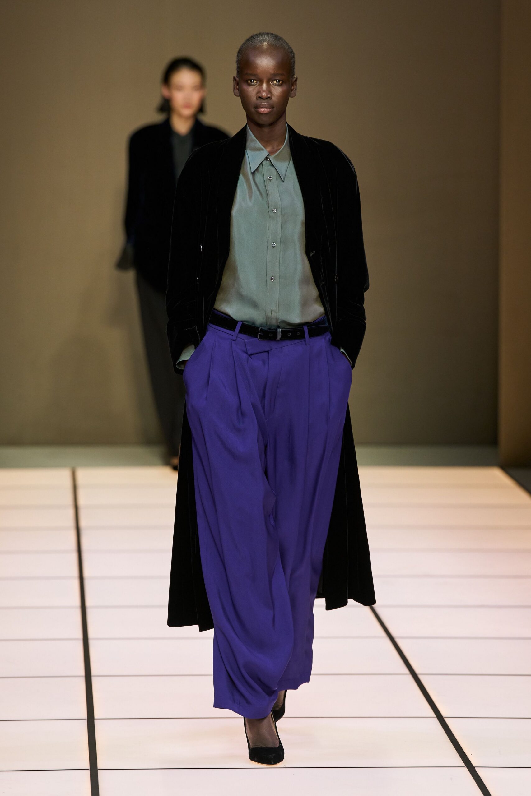 black velvet coat gray shirt purple pants
