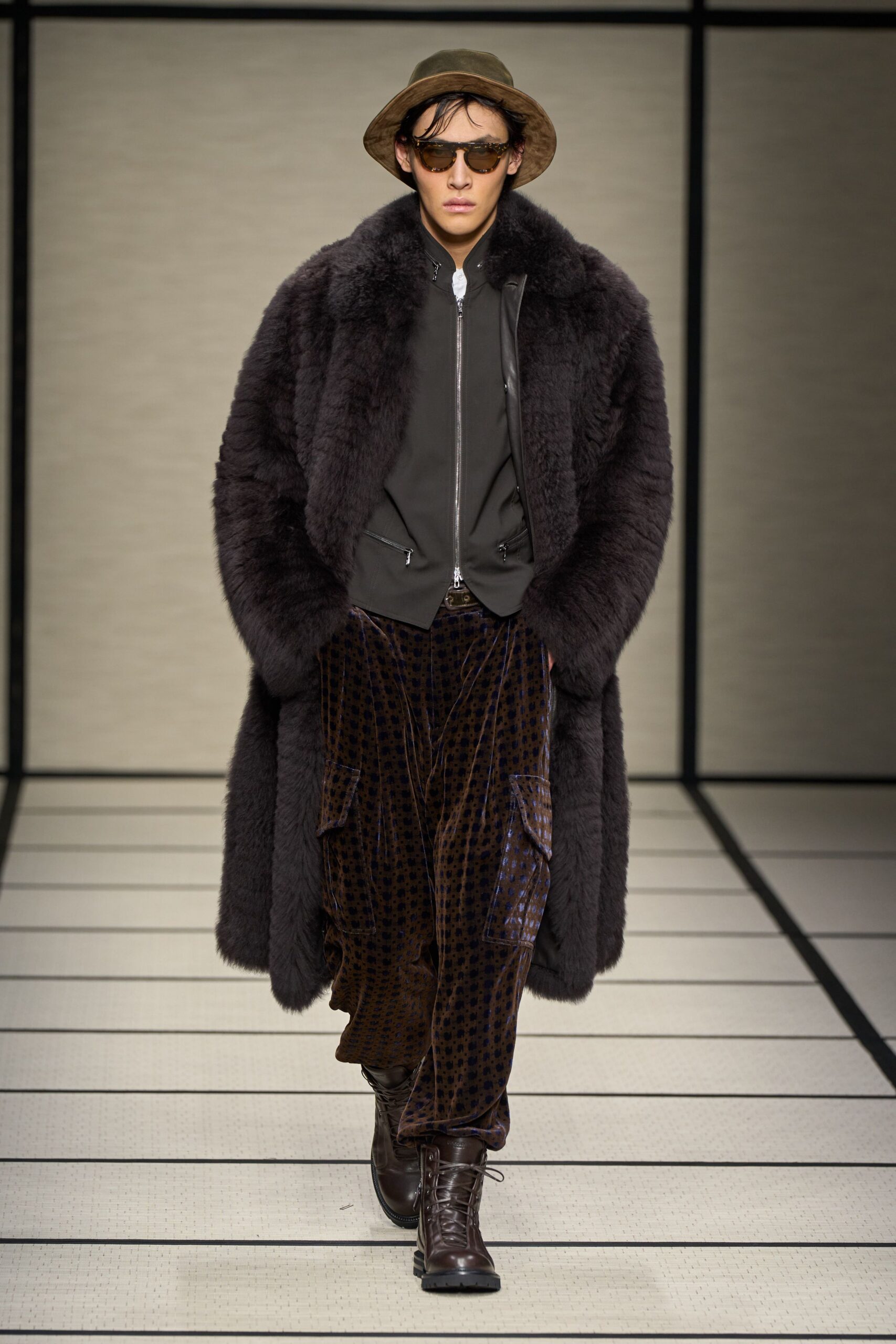 black fur coat gray jacket brown pants
