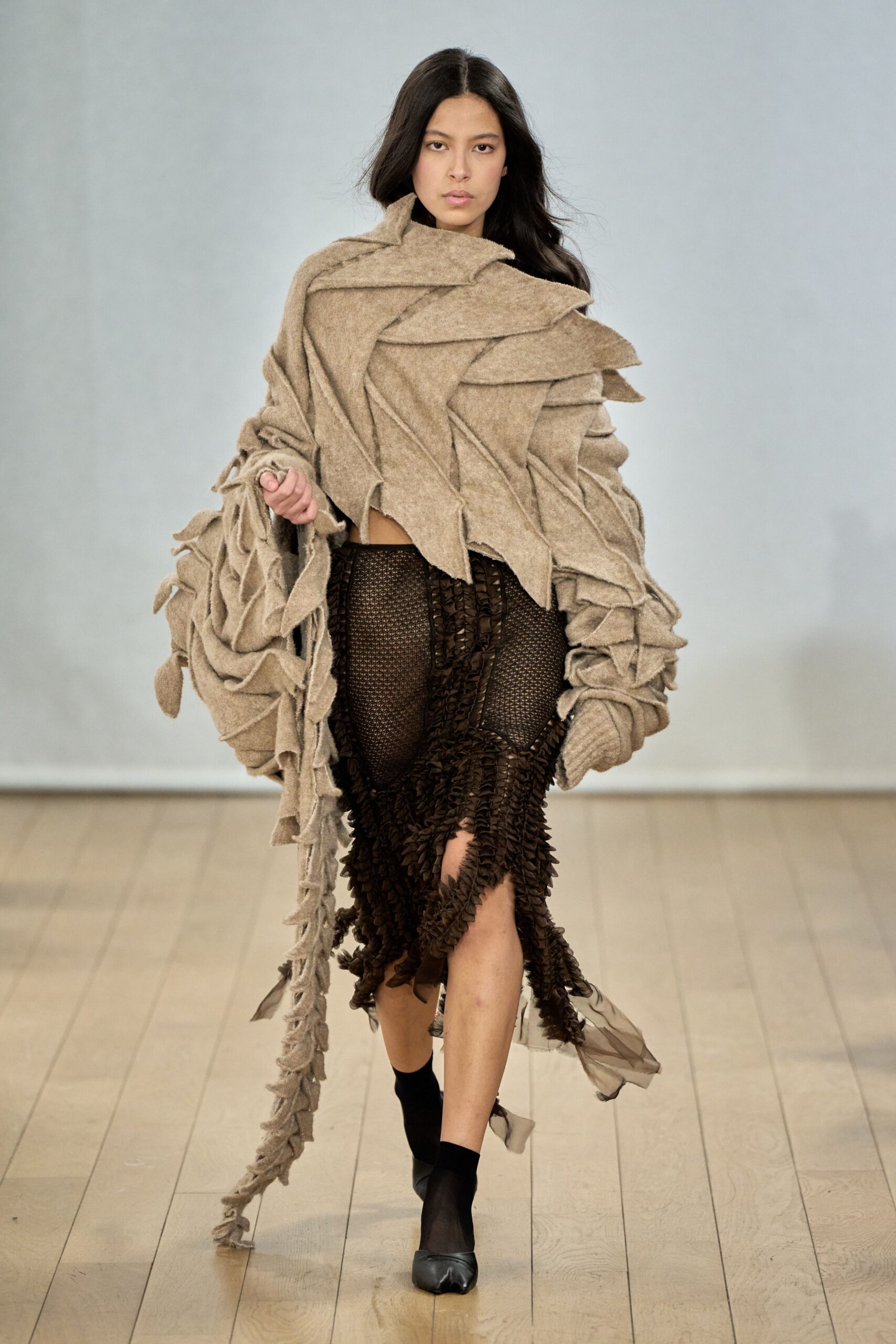 beige wool cape black mesh skirt