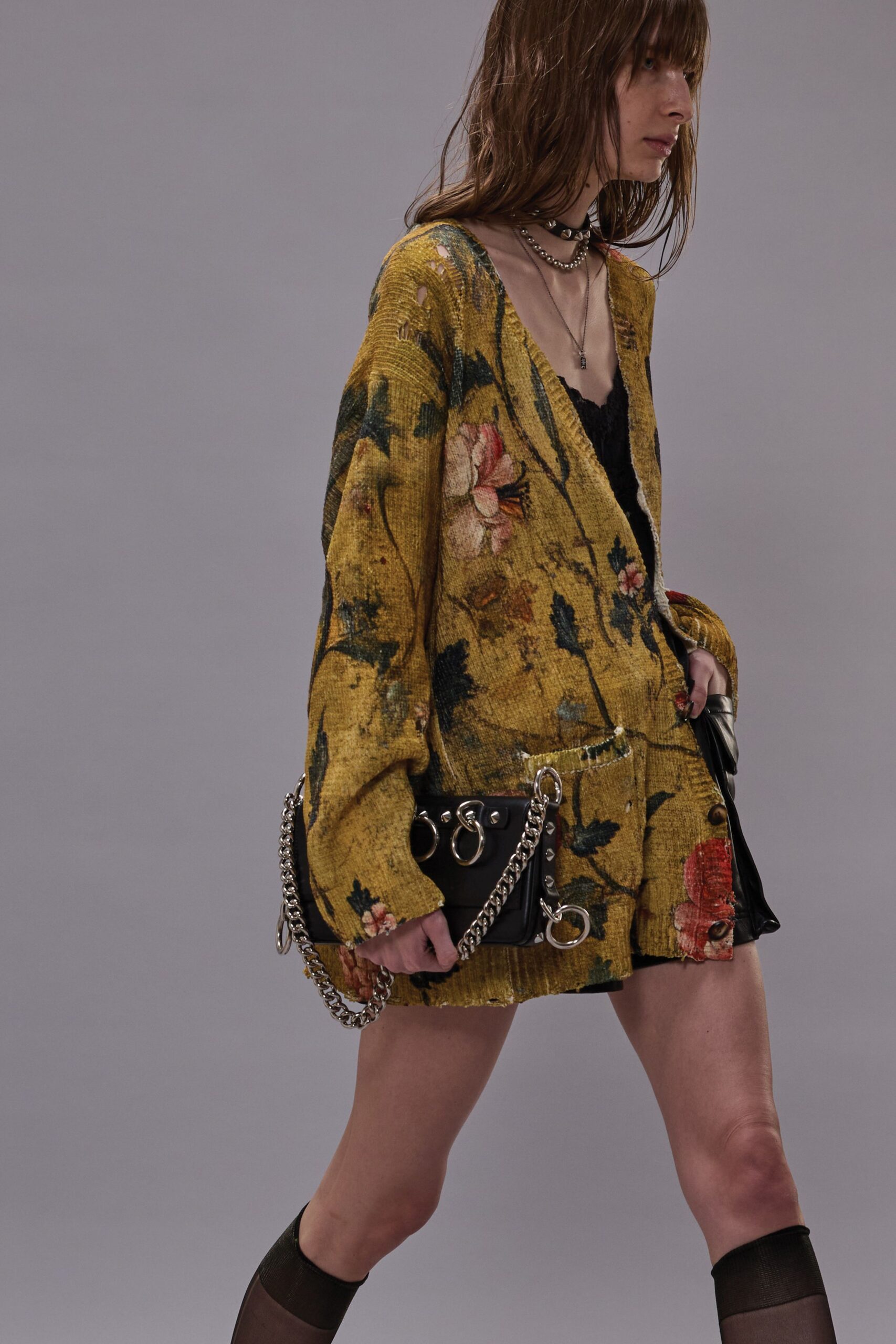 yellow embroidered jacket with black top