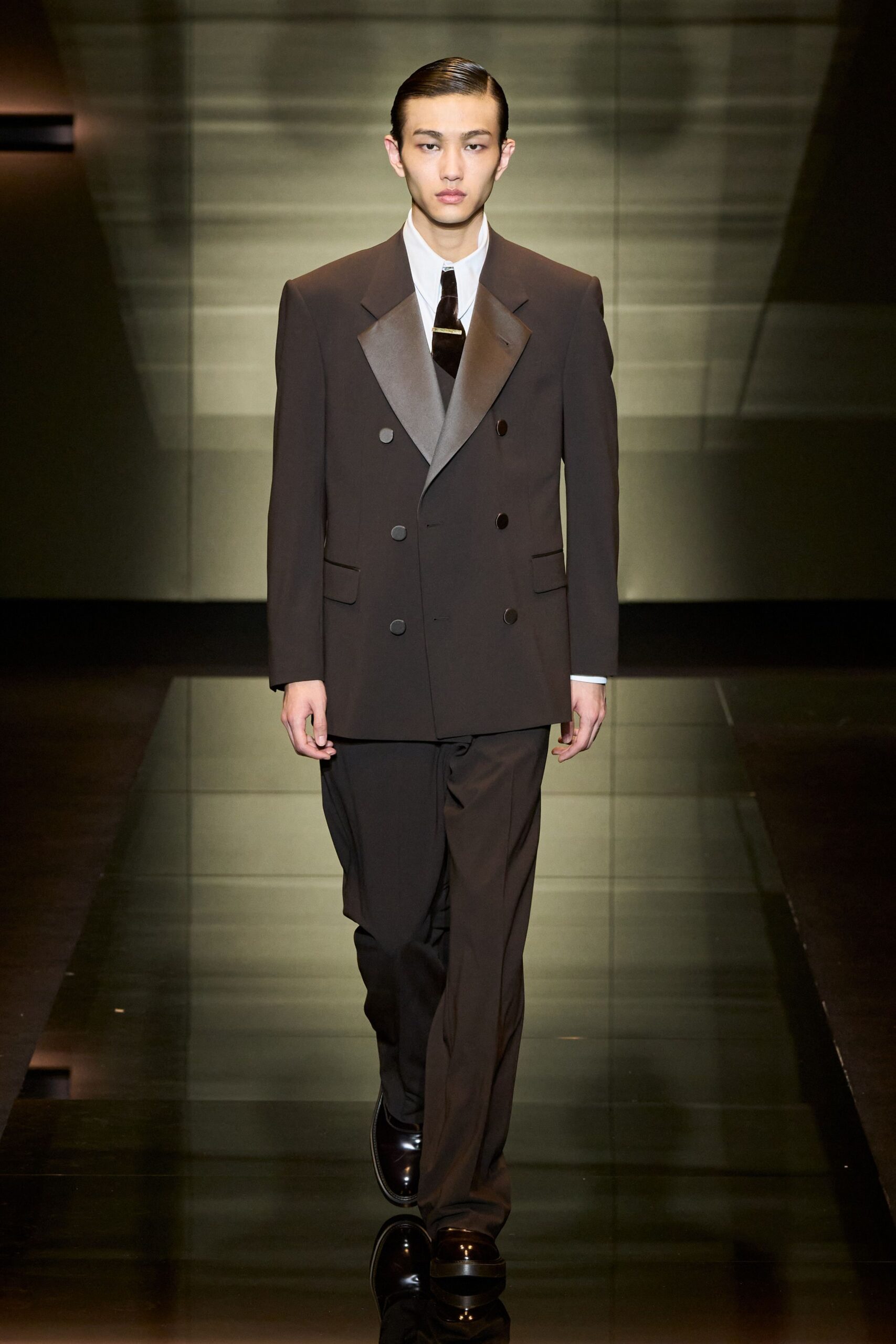 brown tailored suit with white shirt