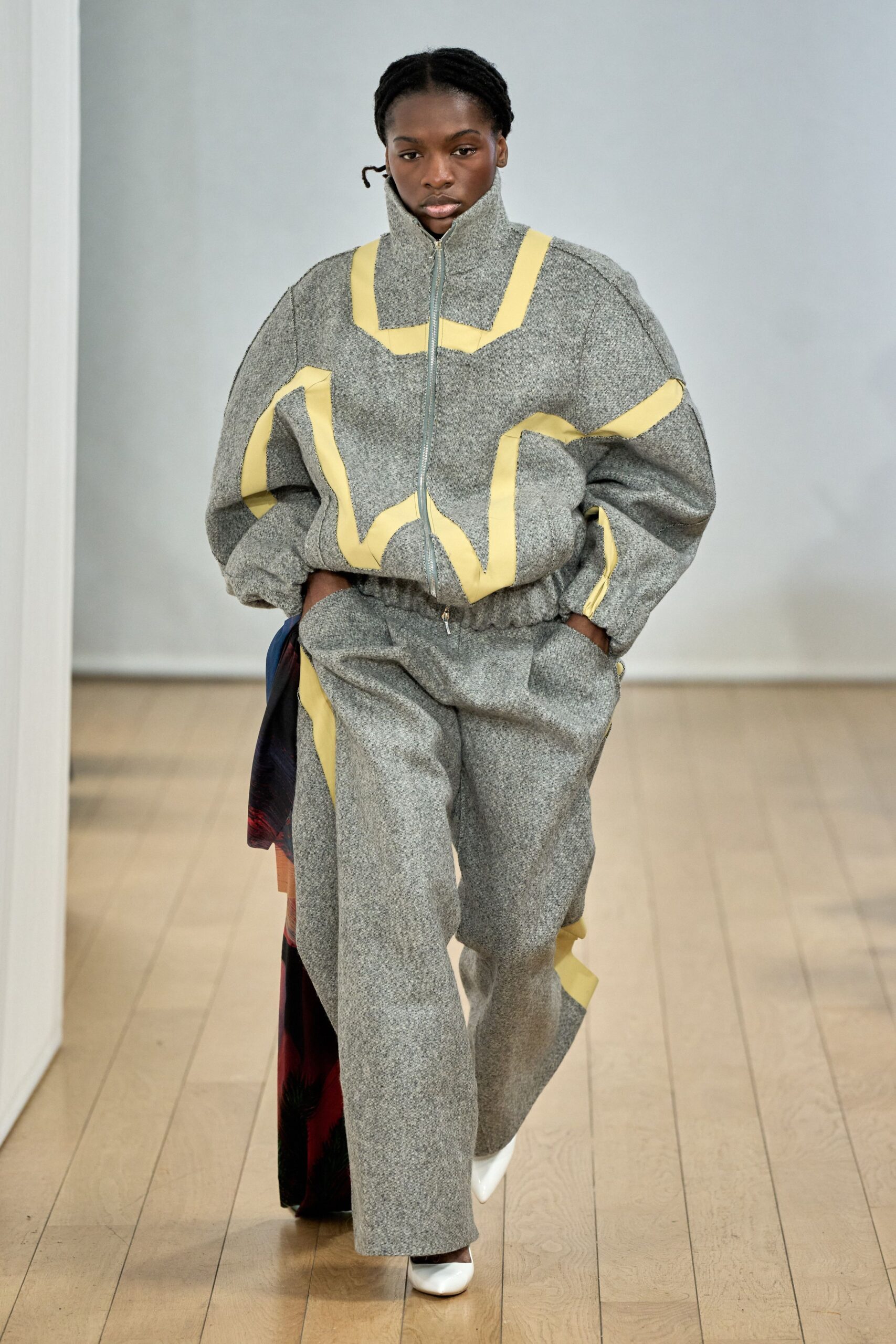 gray oversized jacket with yellow accents
