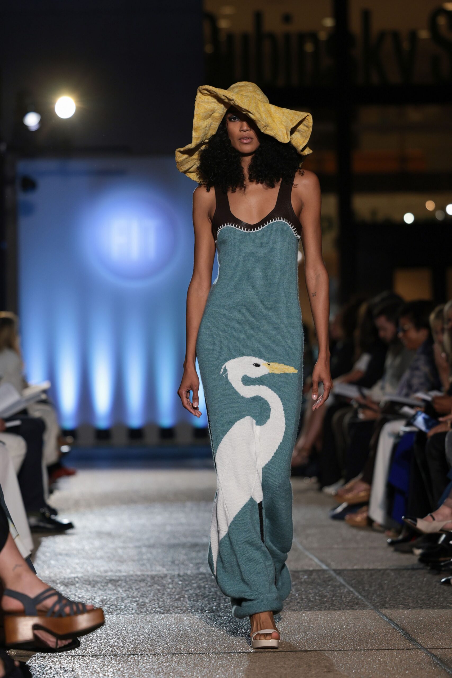 blue printed maxi dress with yellow hat