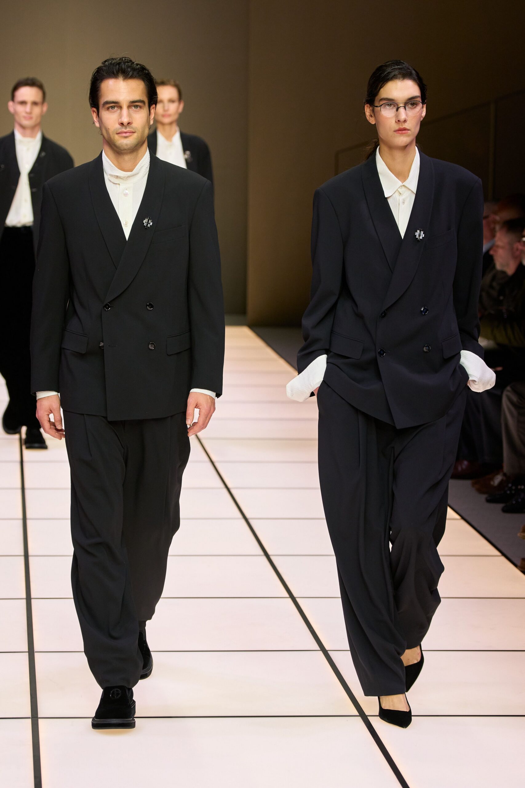 black tailored suit with white shirt