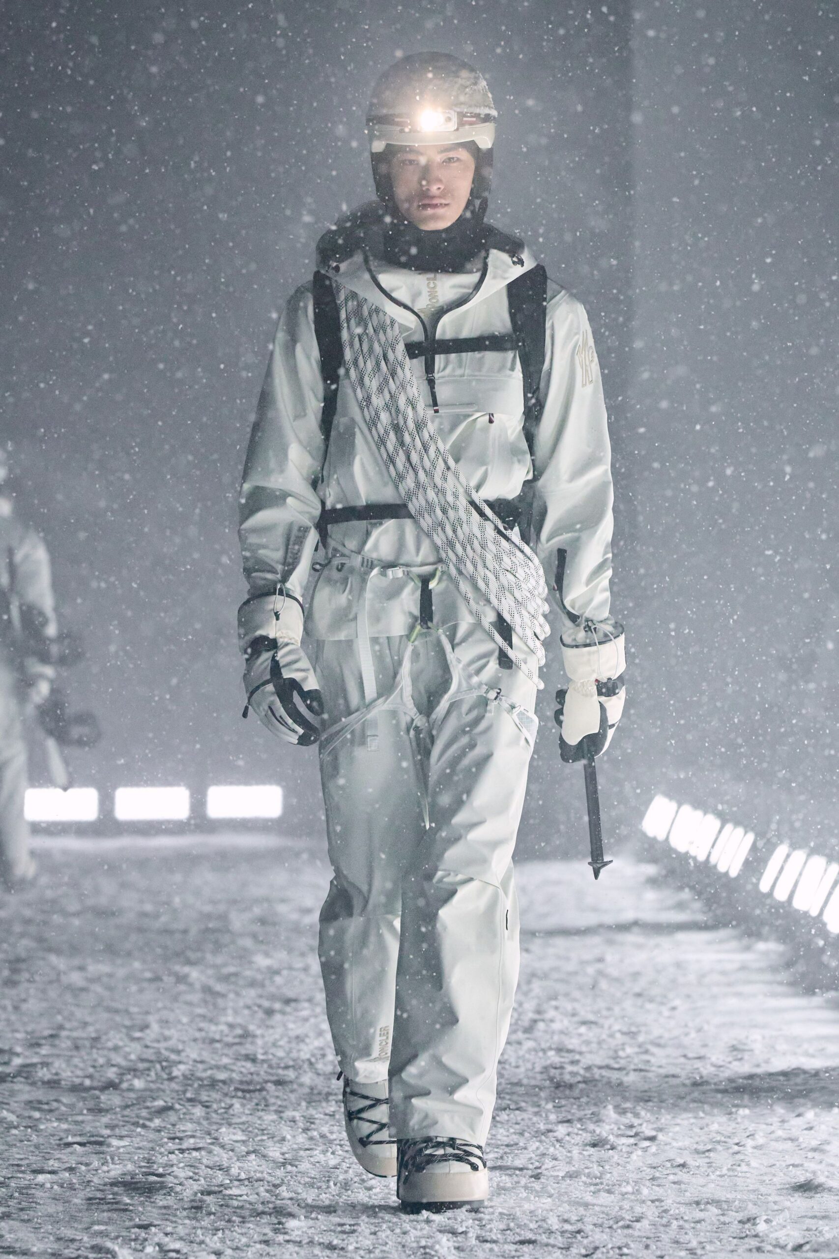 white fitted jumpsuit with boots