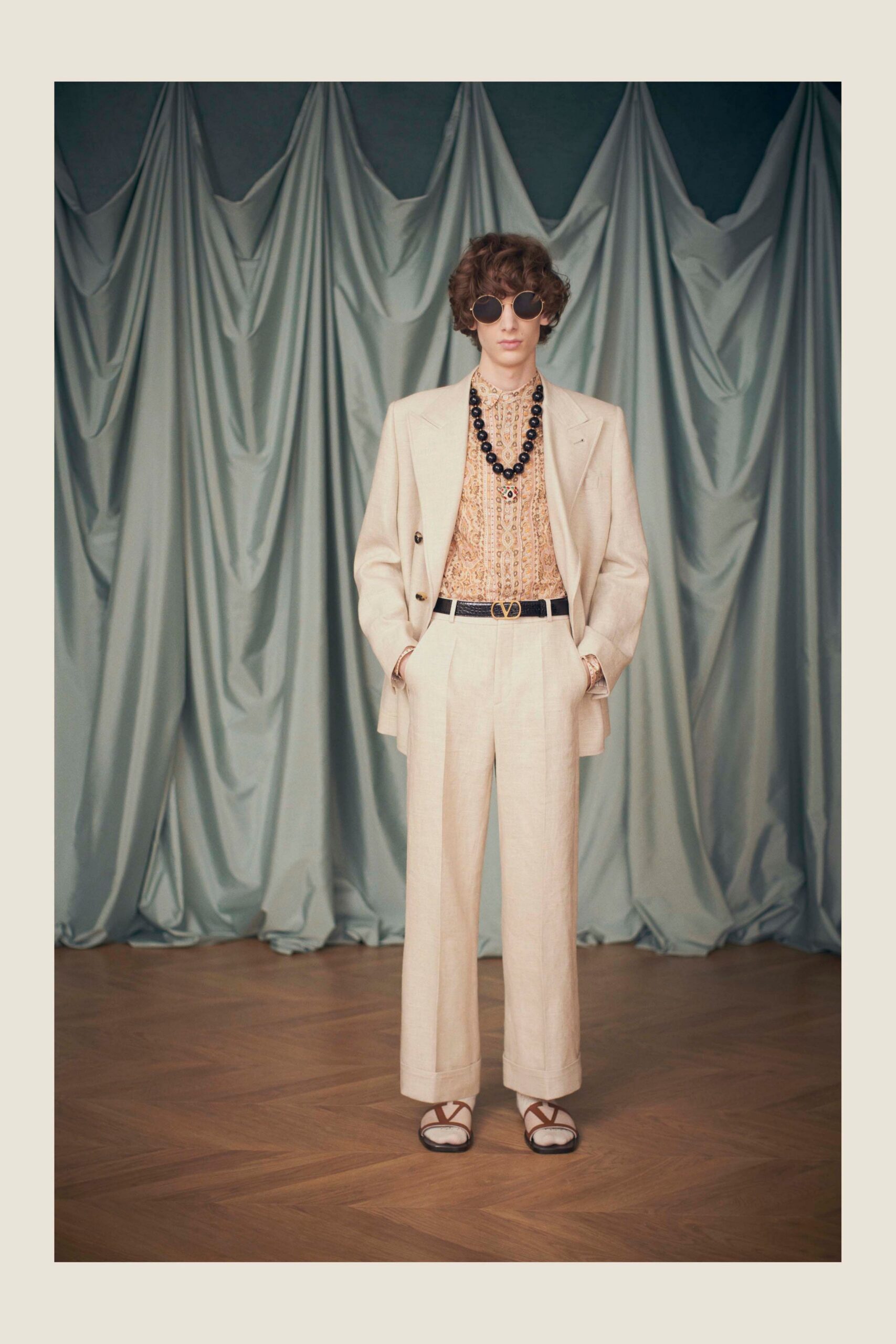 beige tailored suit with accessories