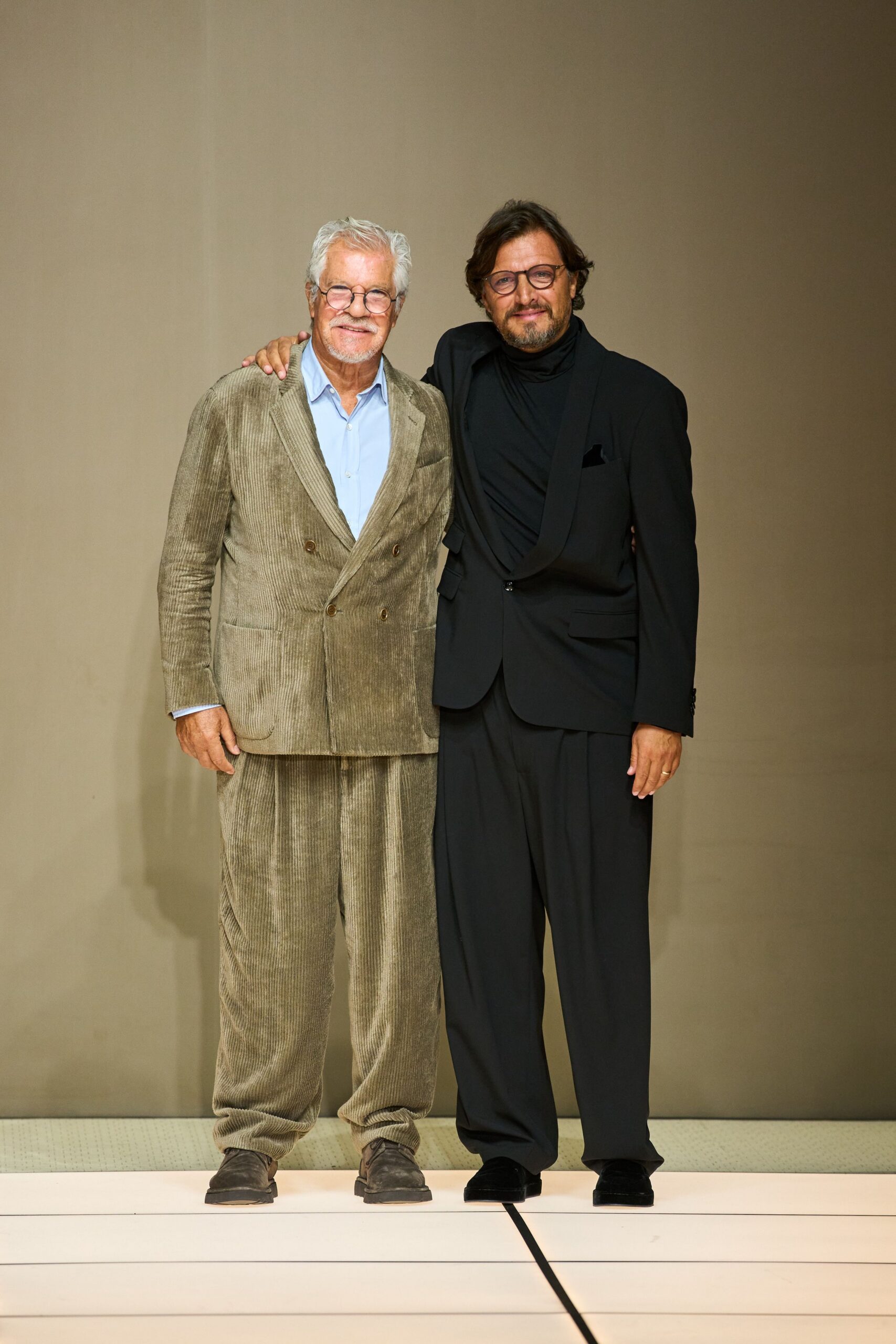 beige and black tailored suits