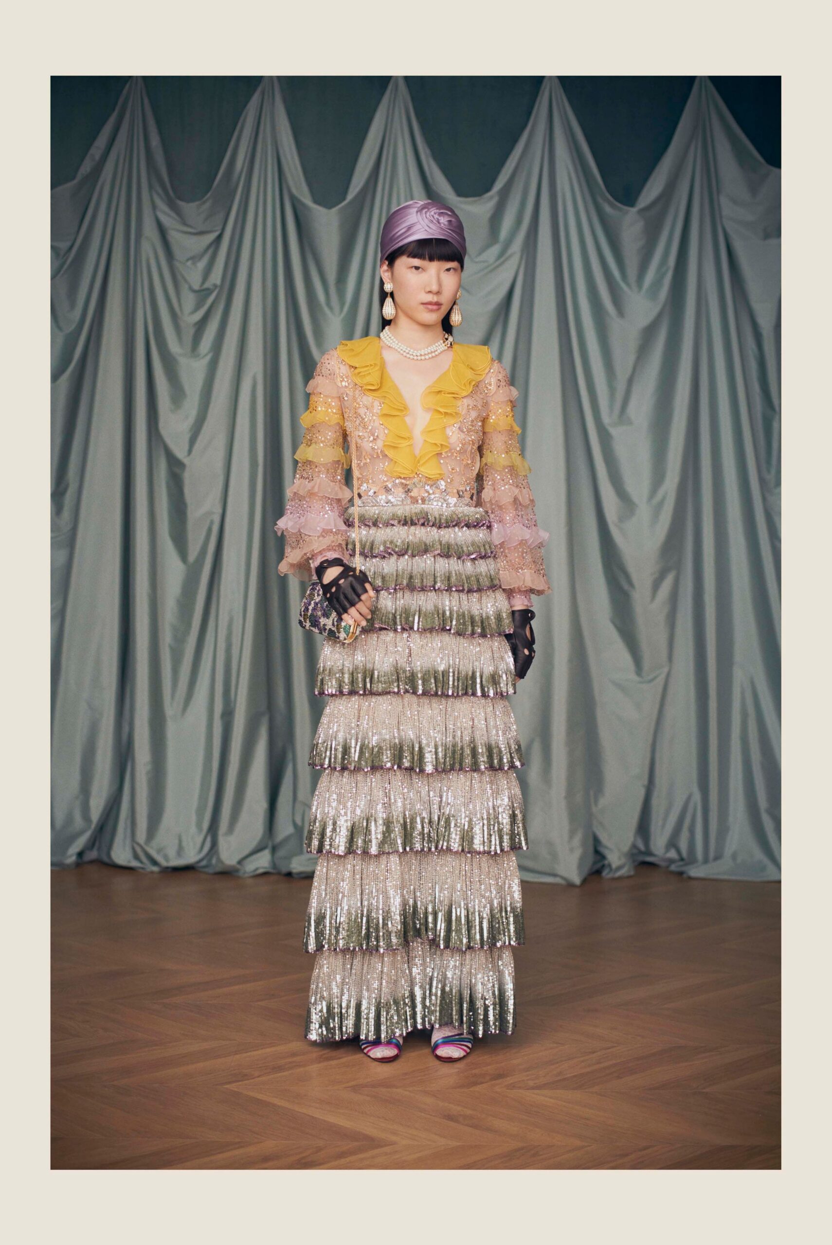 yellow ruffled top with sequined skirt