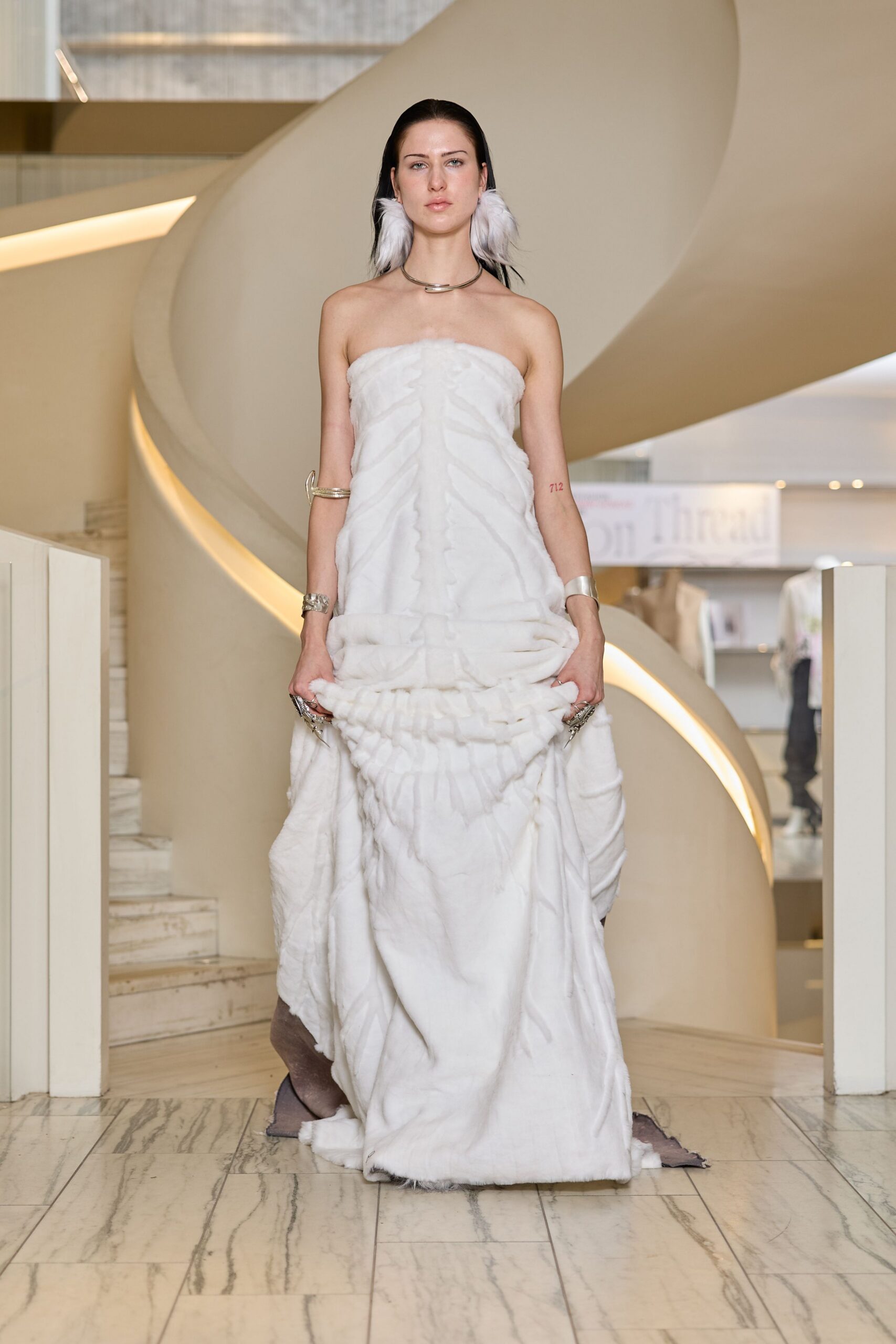 white strapless pleated gown