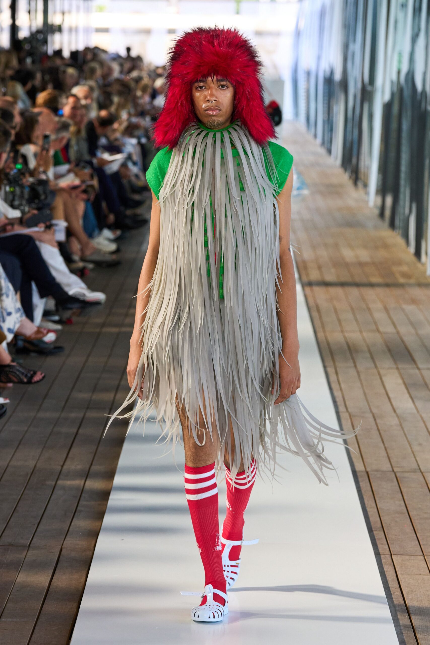 green sleeveless high-neck fitted fringed mini dress