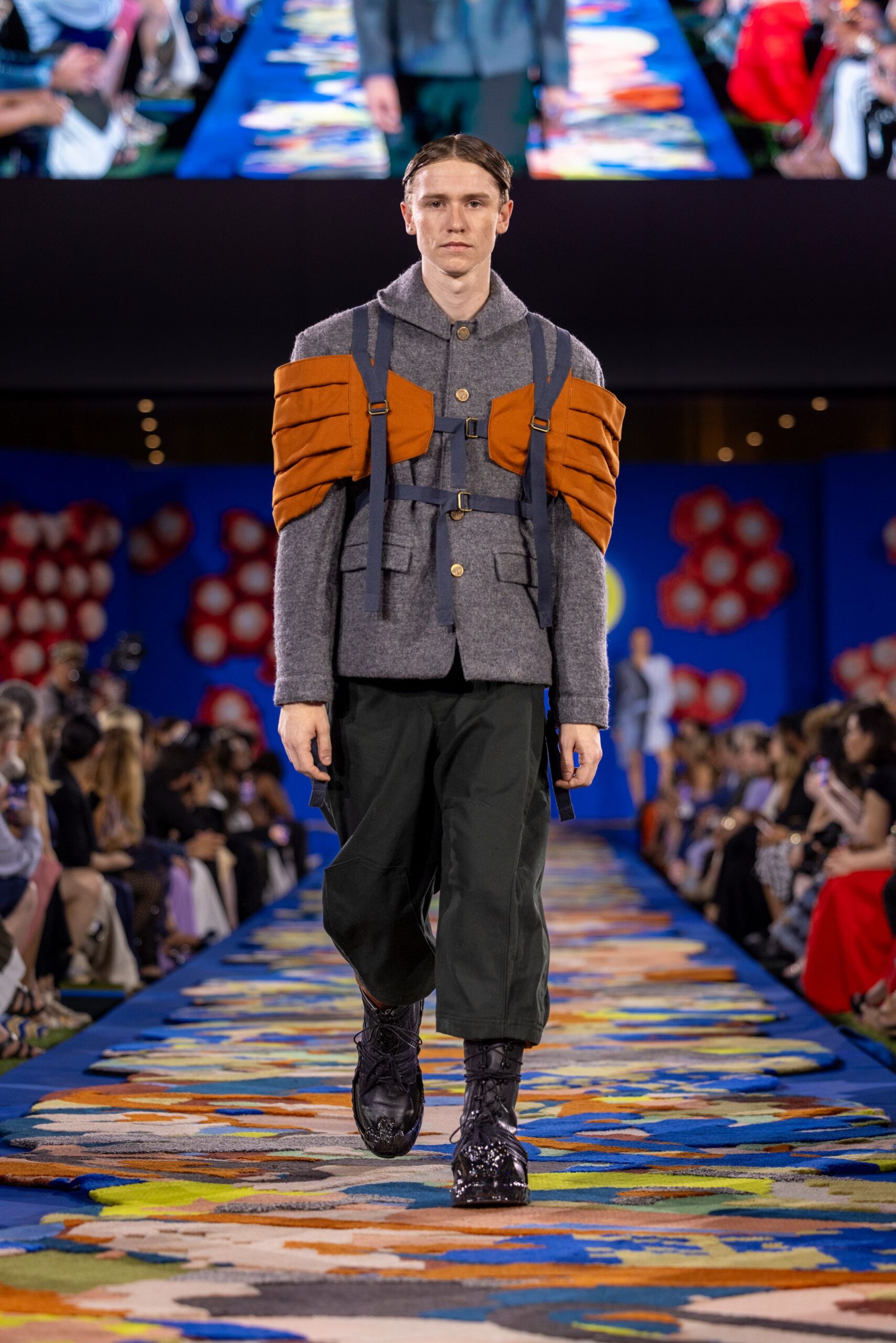 gray structured jacket with black pants