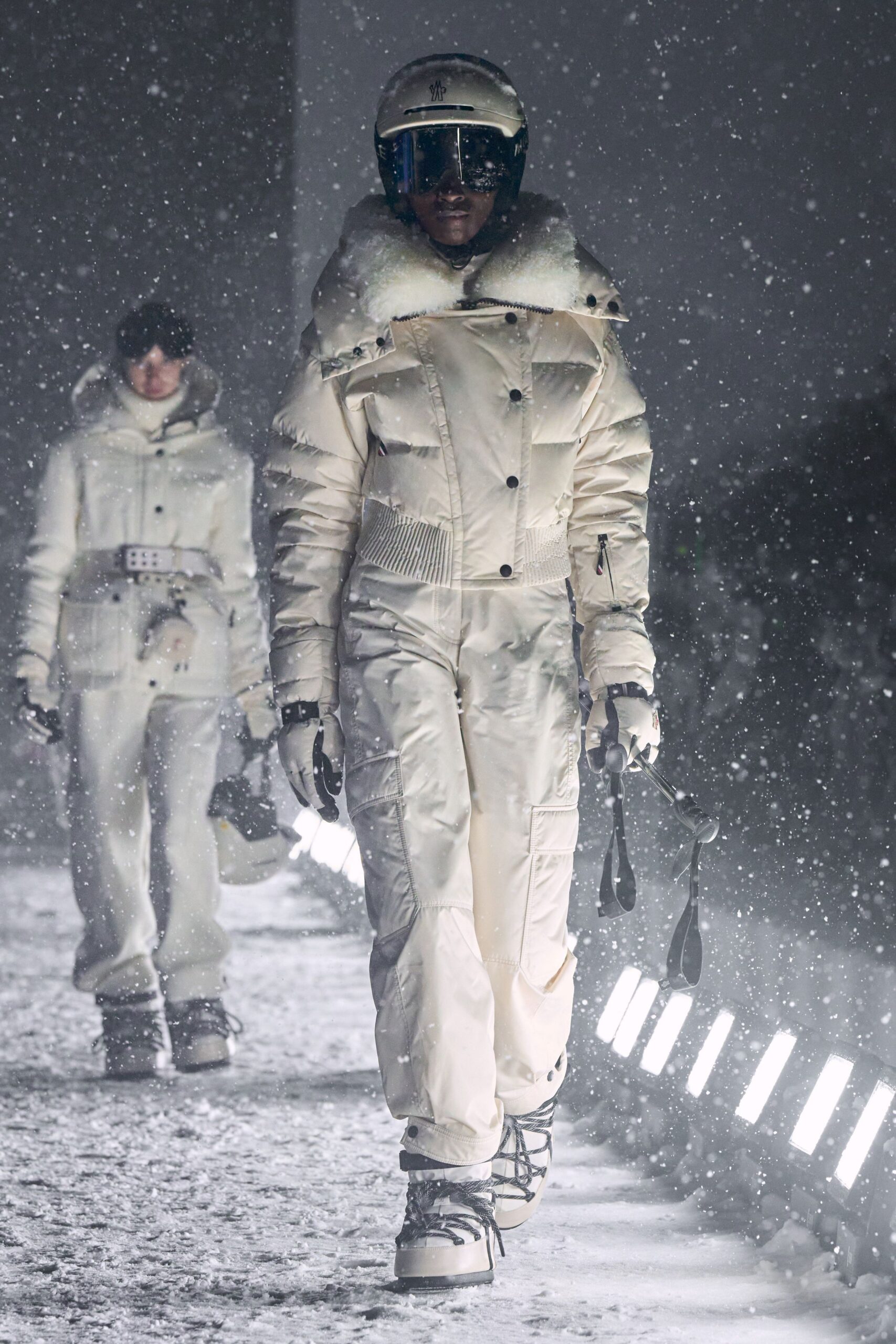 white fitted jumpsuit with hooded jacket