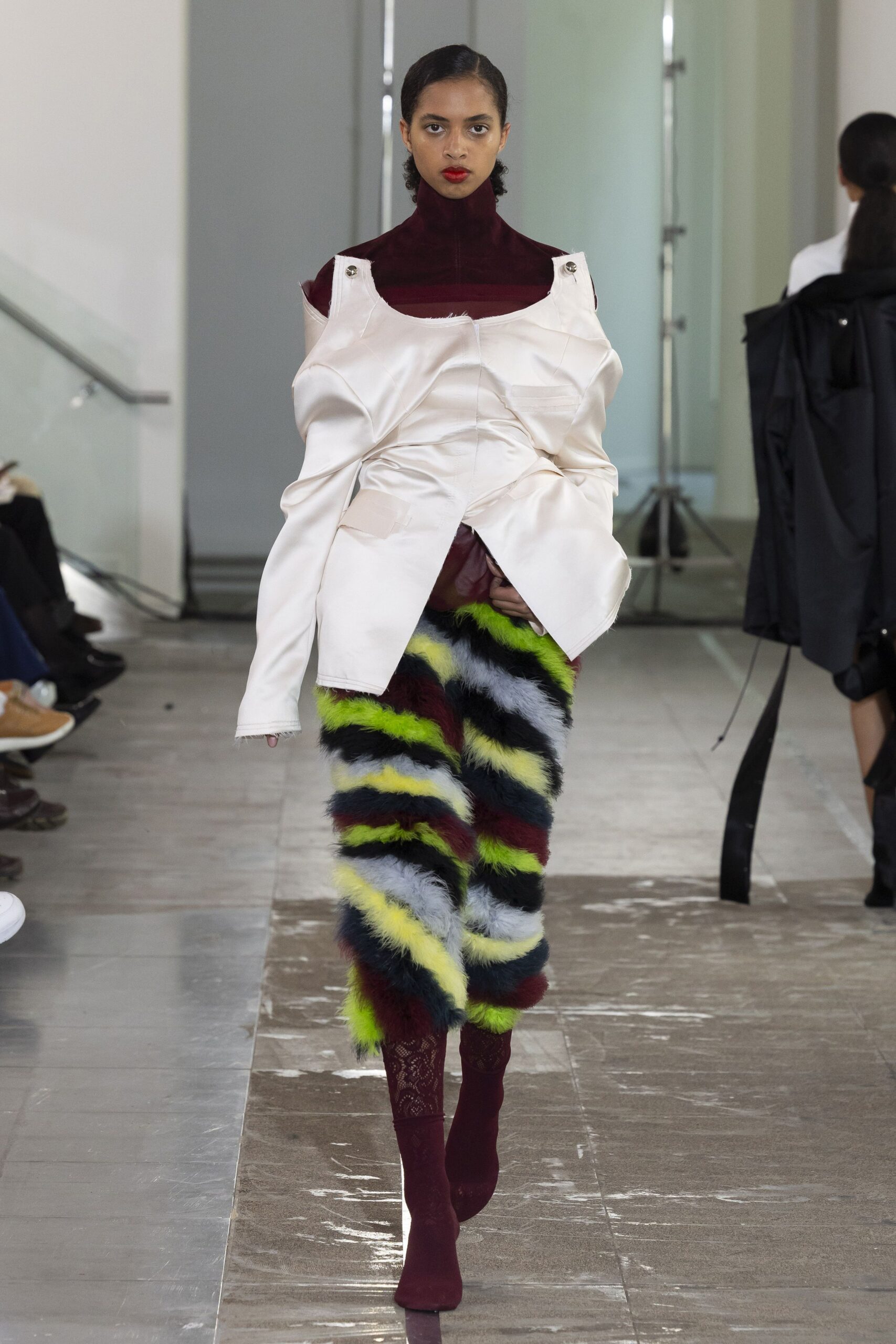 oversized white top with multi fur skirt