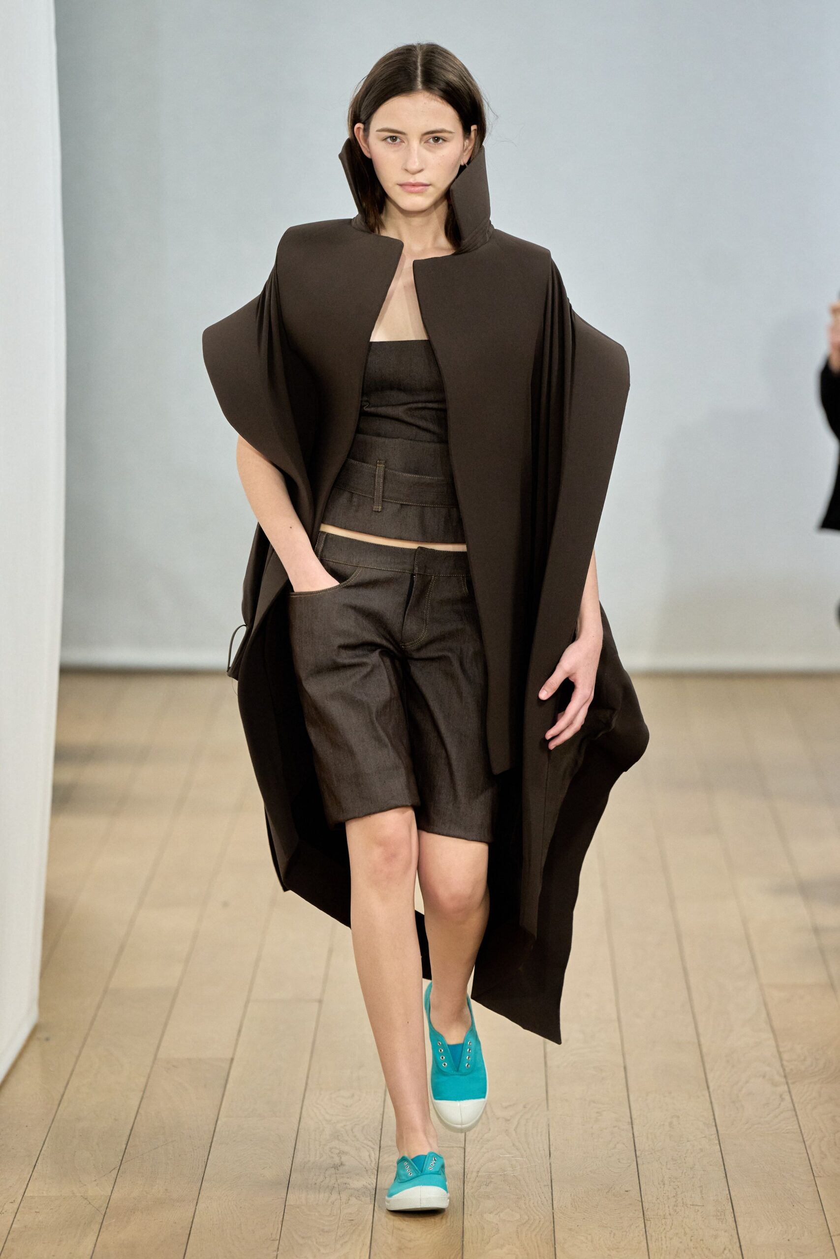brown cape with fitted top and shorts