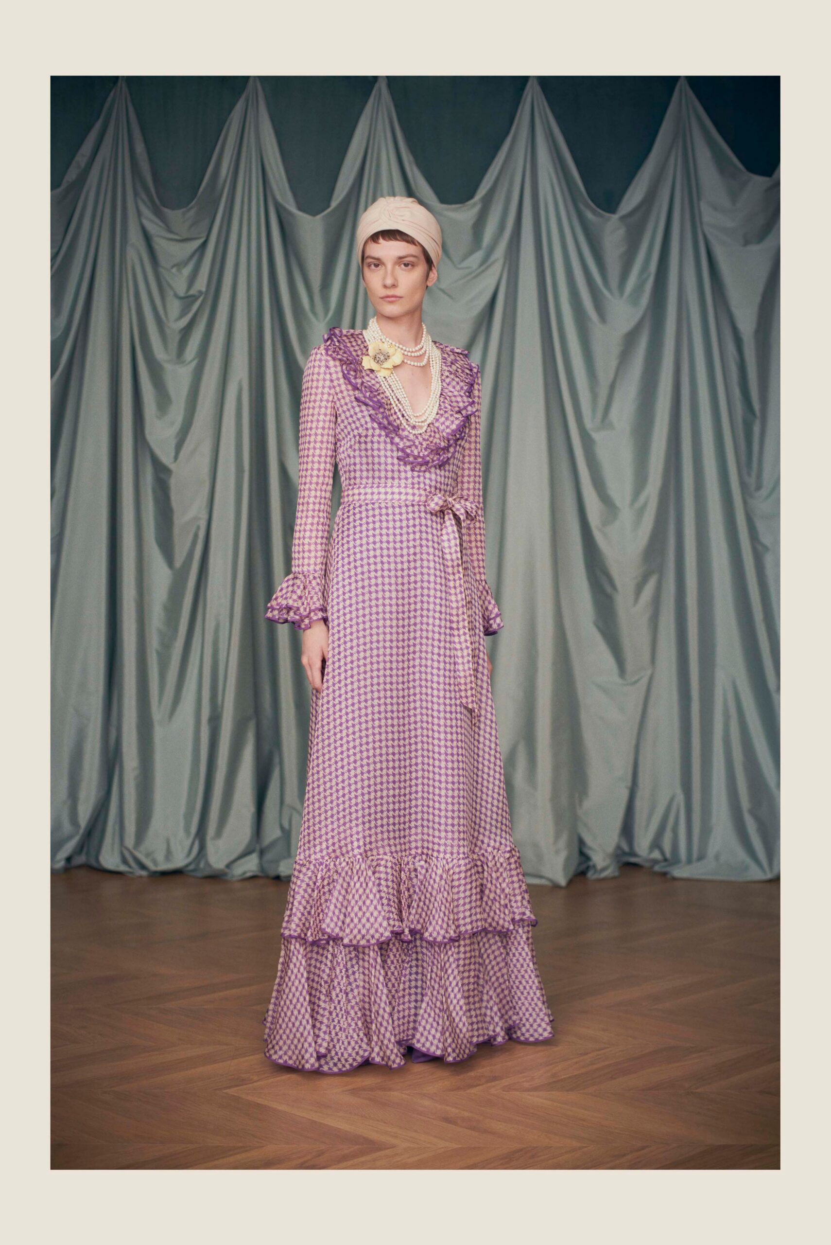 purple silk ruffled gown with headscarf
