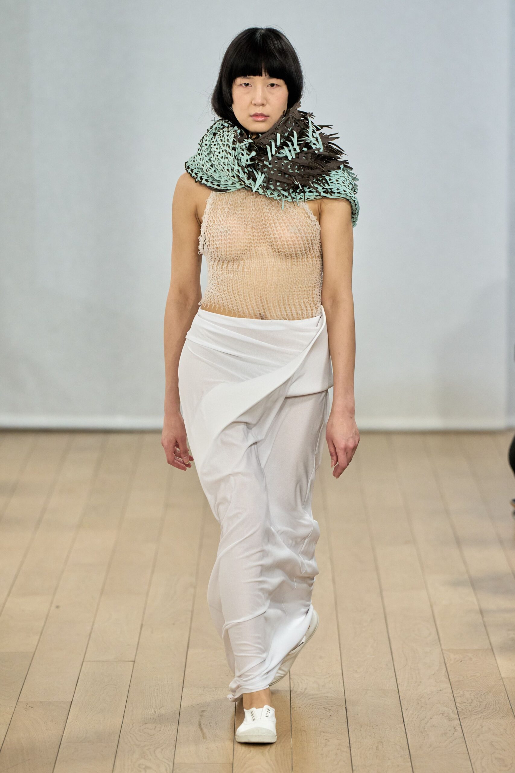 beige fitted top with white skirt