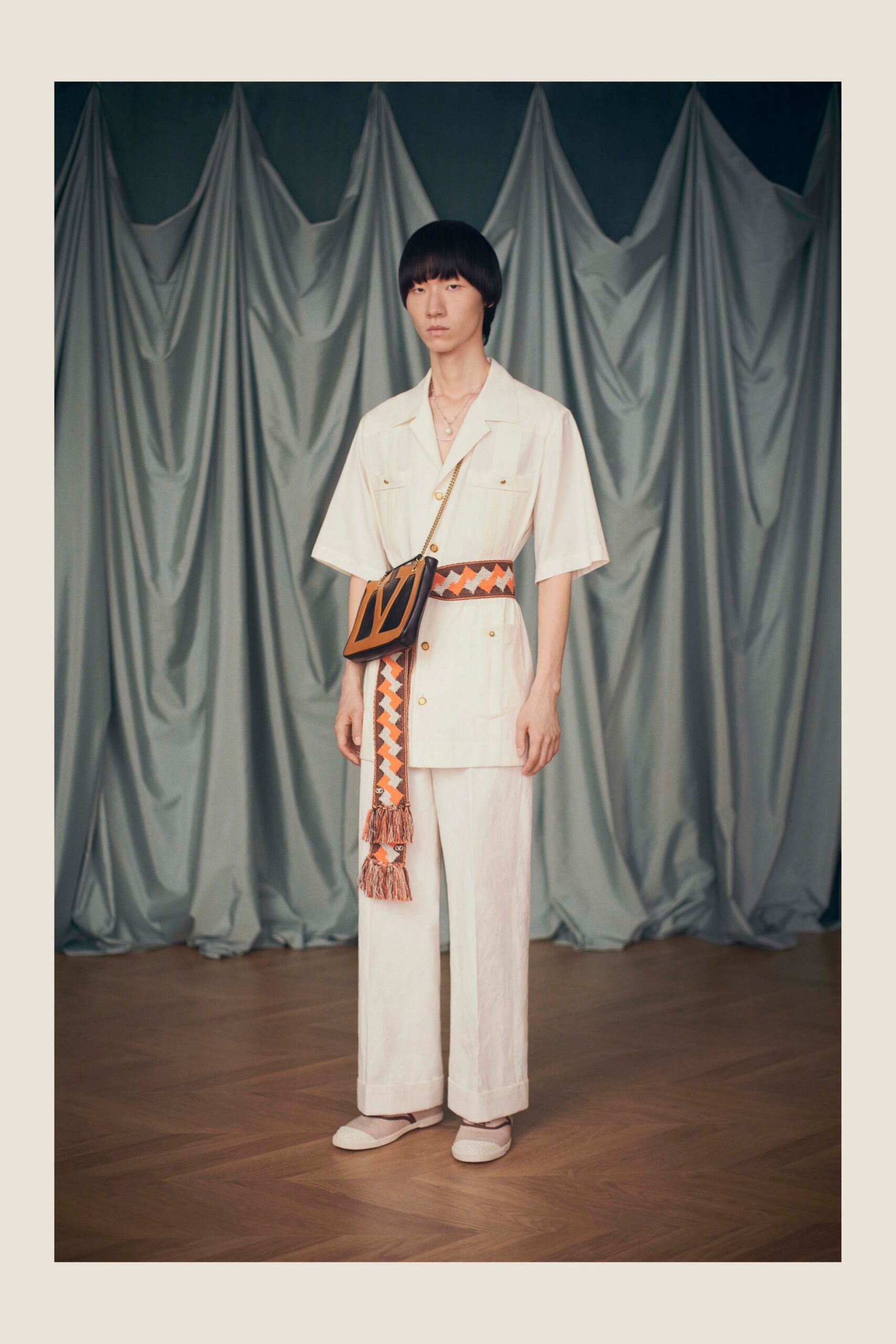 white relaxed shirt and pants