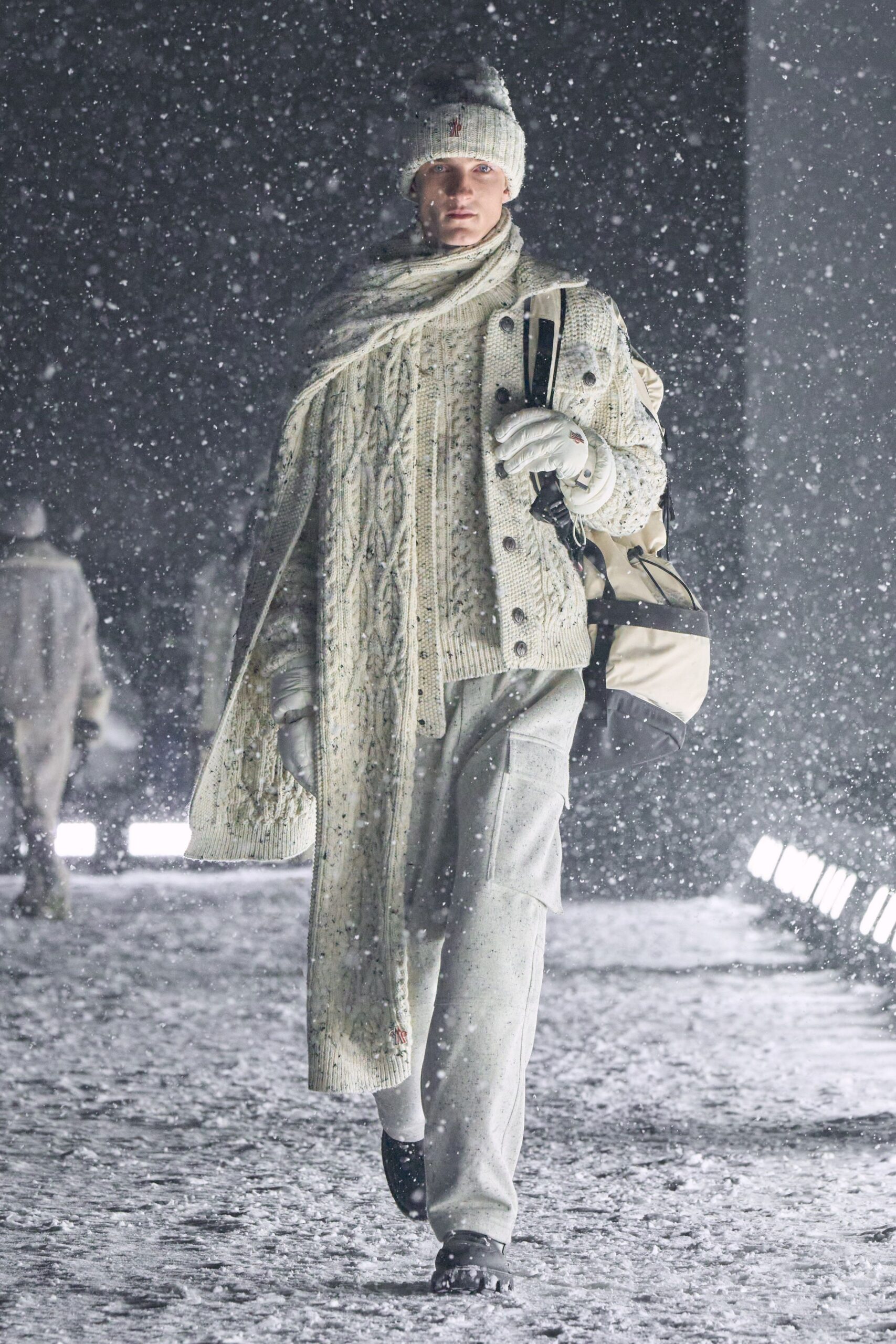white wool coat with cream sweater