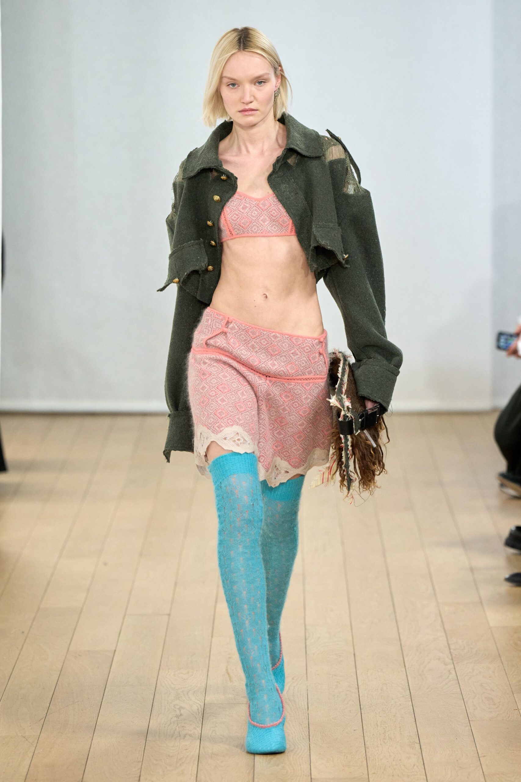 green jacket pink mini skirt